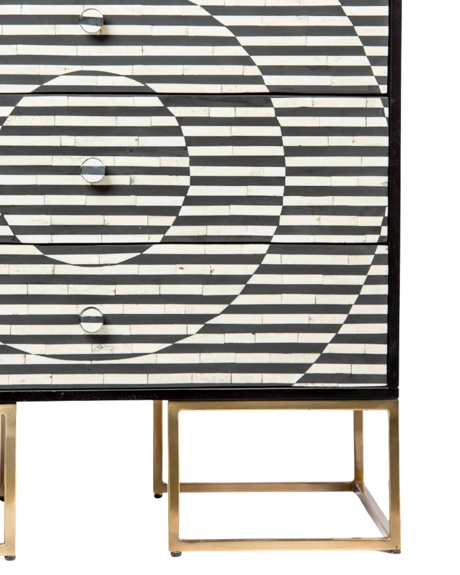Black and white geometric bone inlay chest of drawers with gold base.