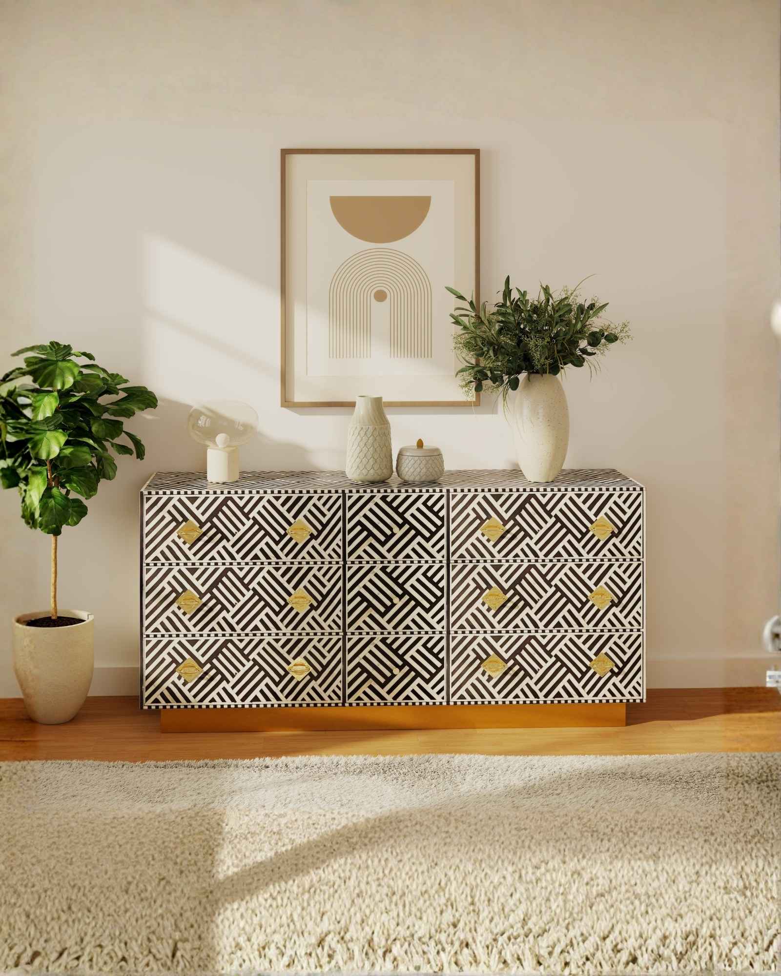 Luxury black and white bone inlay chest of drawers with brass accents and geometric design, handcrafted for statement interiors.