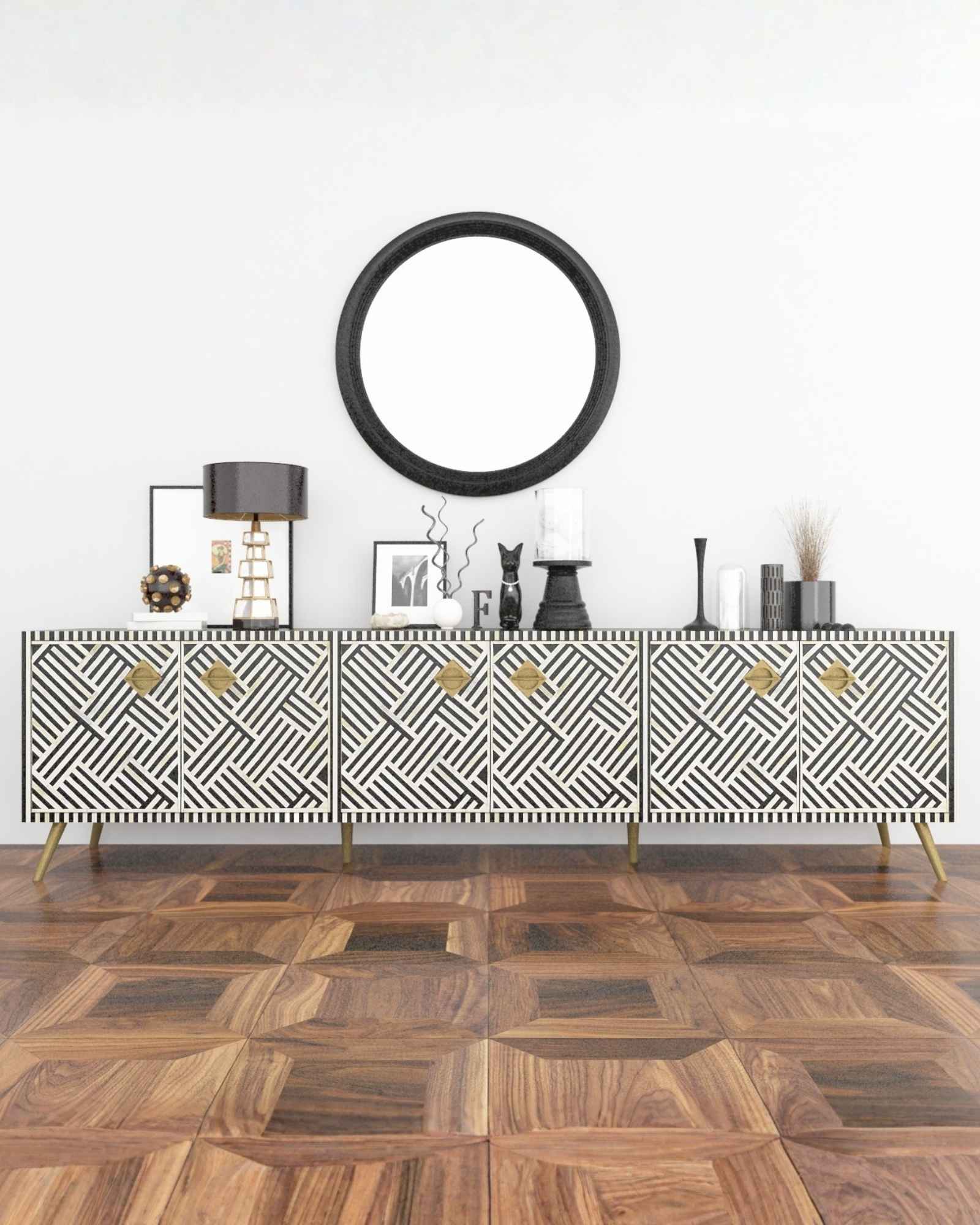Handcrafted Black & White TV Unit Cabinet with intricate Bone inlay, featuring a striped pattern and sleek Metal legs. A luxurious storage solution for any space.