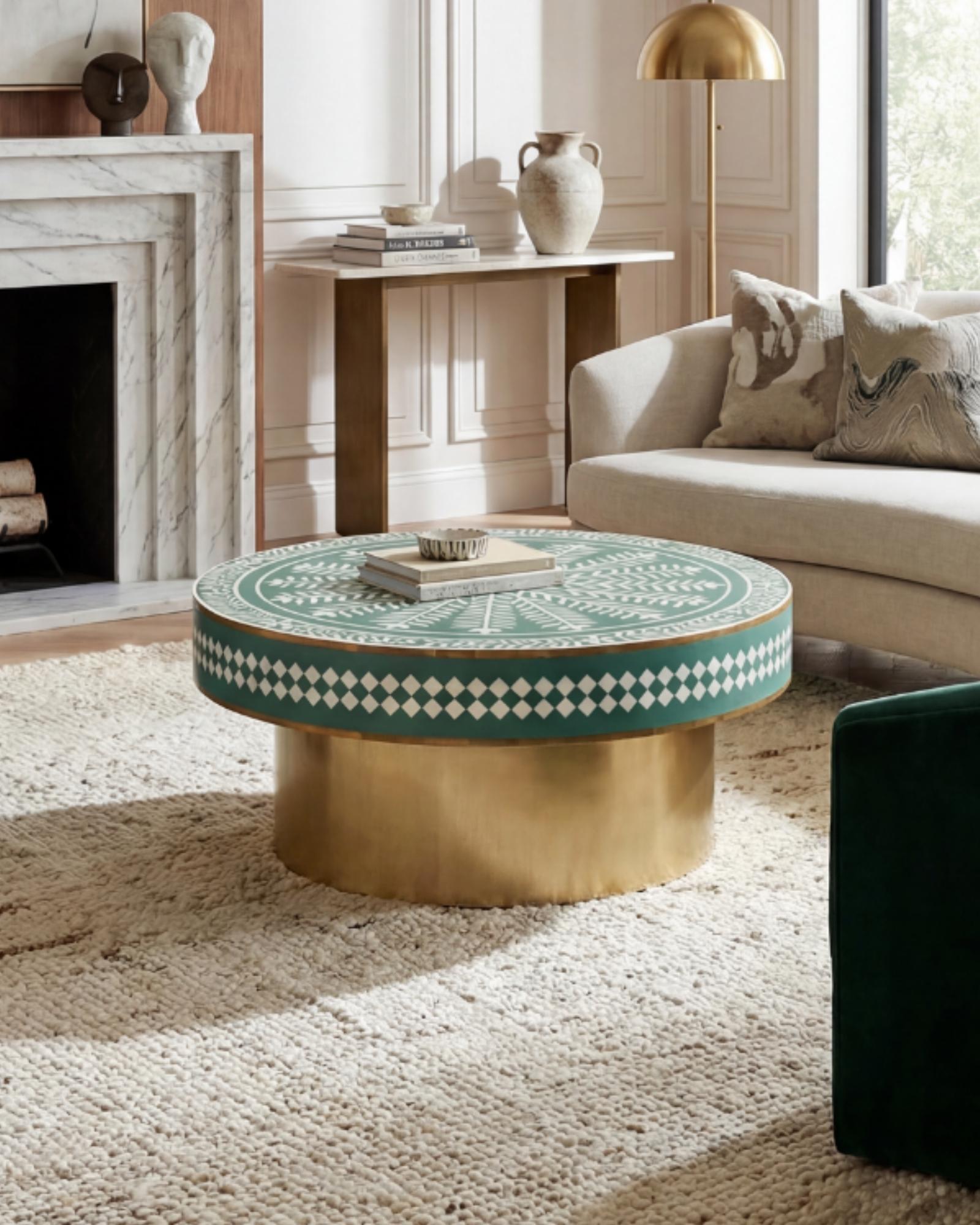 Green floral patterned bone inlay coffee table with diamond border detail and brushed gold cylindrical base by Tabeer Homes.