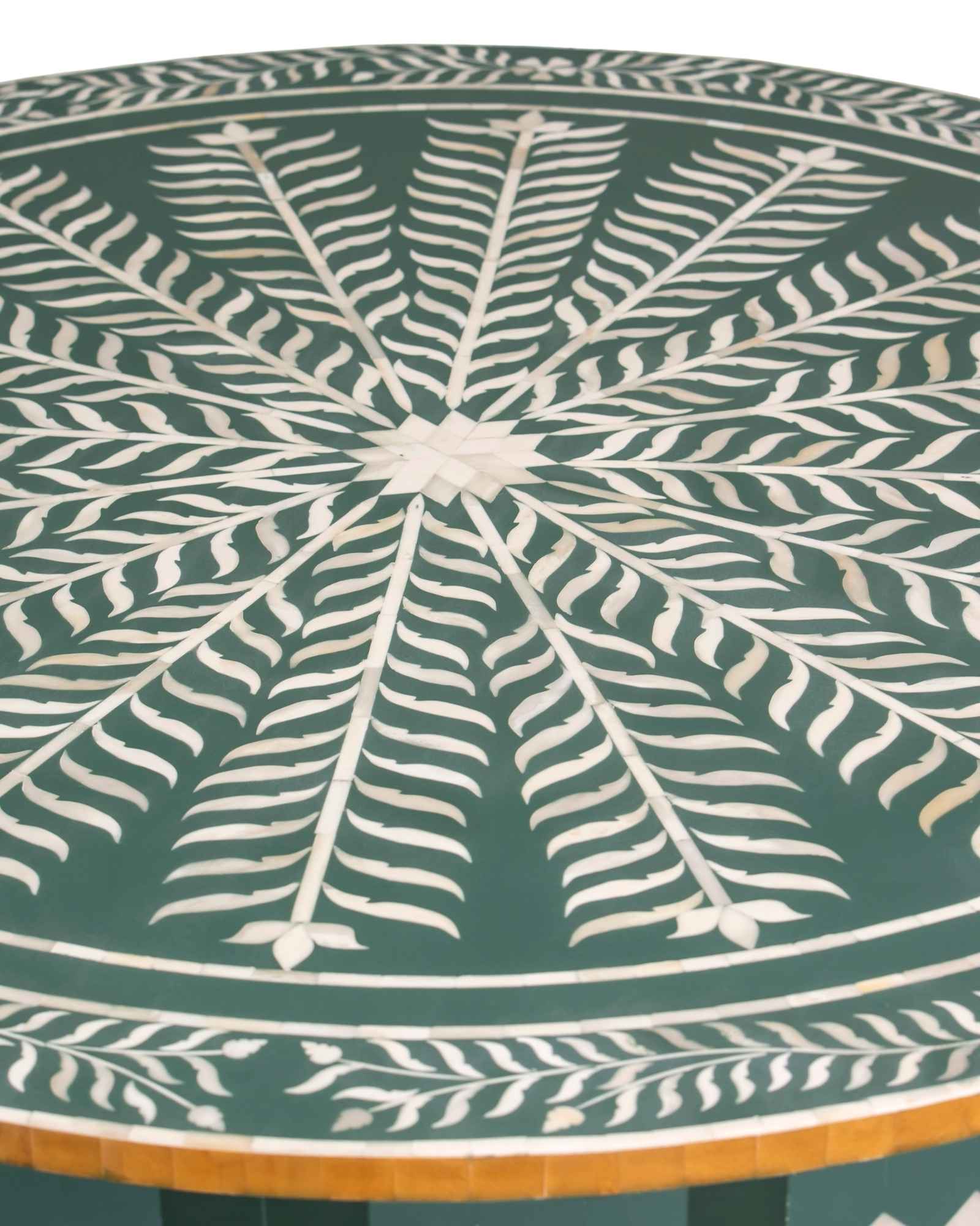 Bone inlay coffee table featuring intricate radial floral pattern in green and white, handcrafted furniture piece.