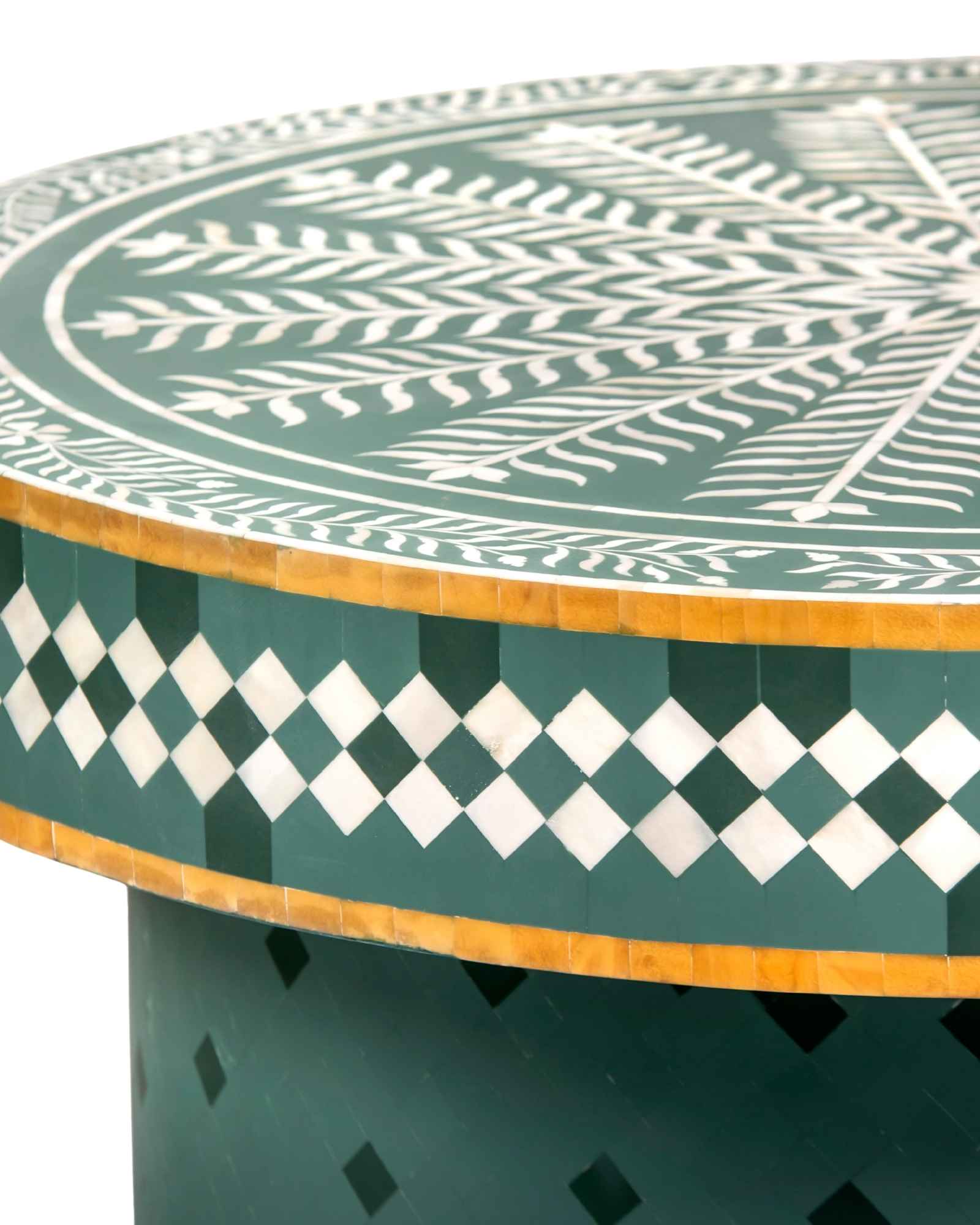 Bone inlay coffee table featuring intricate radial floral pattern in green and white, handcrafted furniture piece.