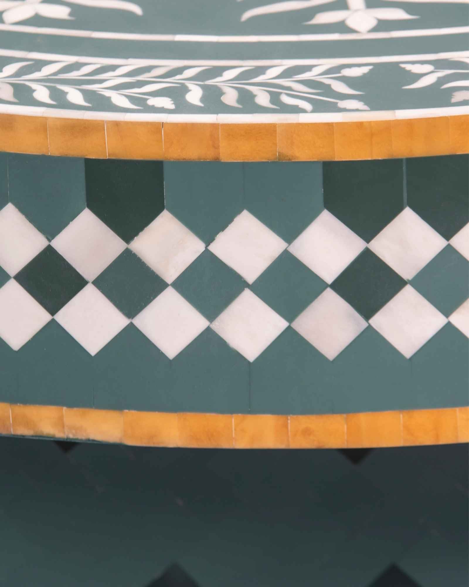 Bone inlay coffee table featuring intricate radial floral pattern in green and white, handcrafted furniture piece.