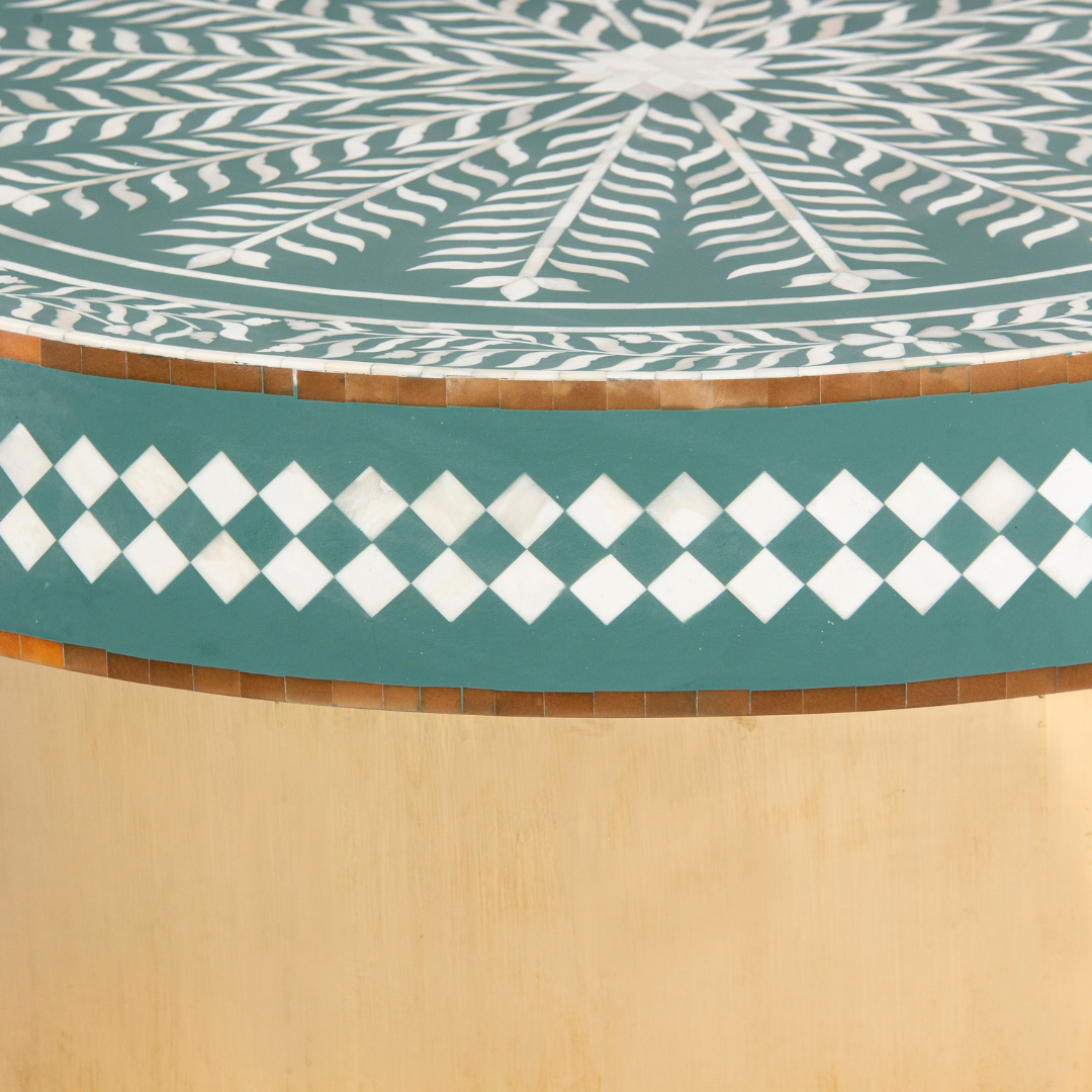 Green floral patterned bone inlay coffee table with diamond border detail and brushed gold cylindrical base by Tabeer Homes.