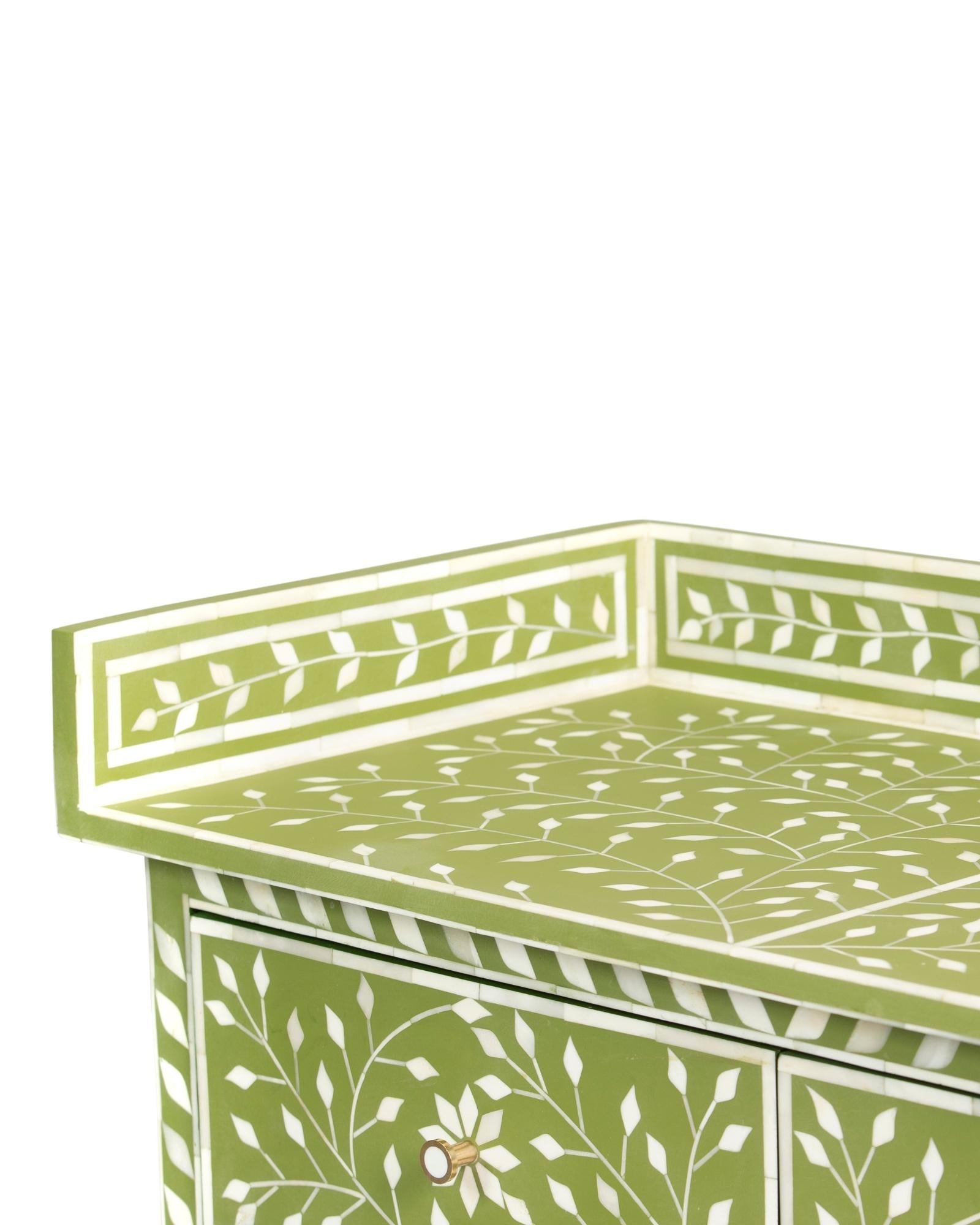 Bone inlay chest of drawers featuring intricate floral vine pattern in green and white, handcrafted furniture piece.