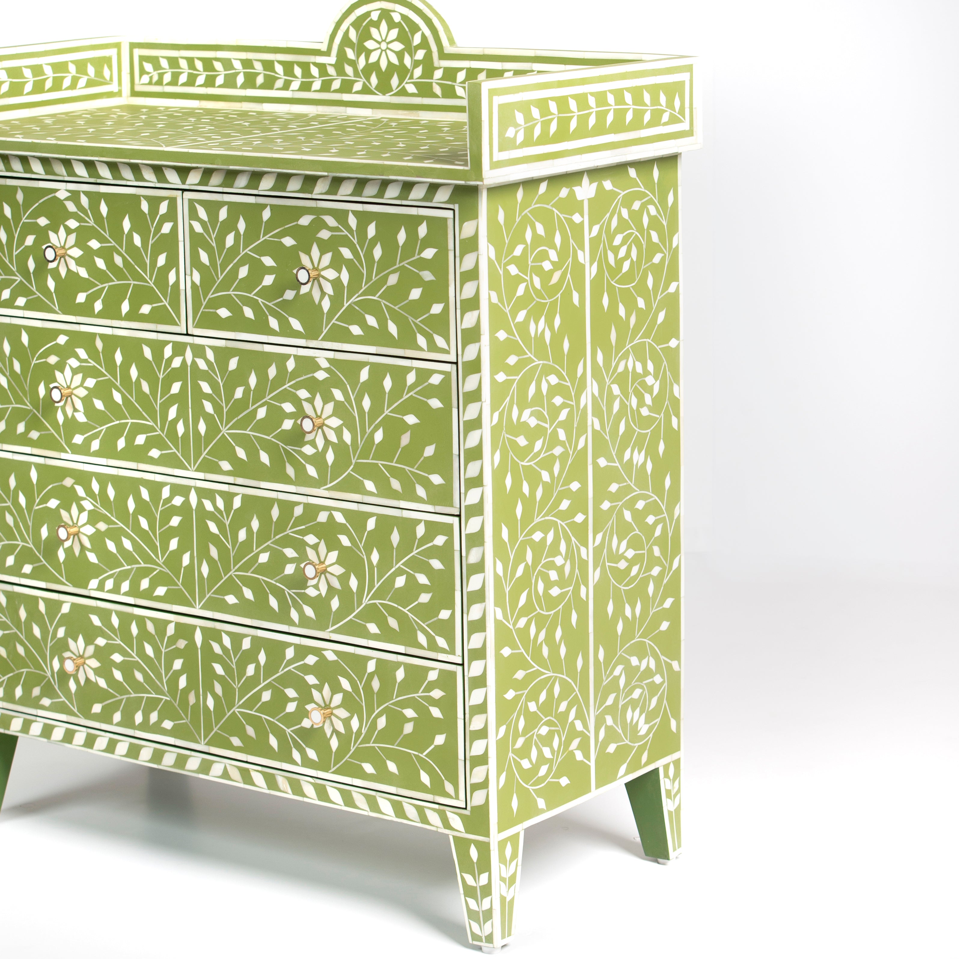 Bone inlay chest of drawers featuring intricate floral vine pattern in green and white, handcrafted furniture piece