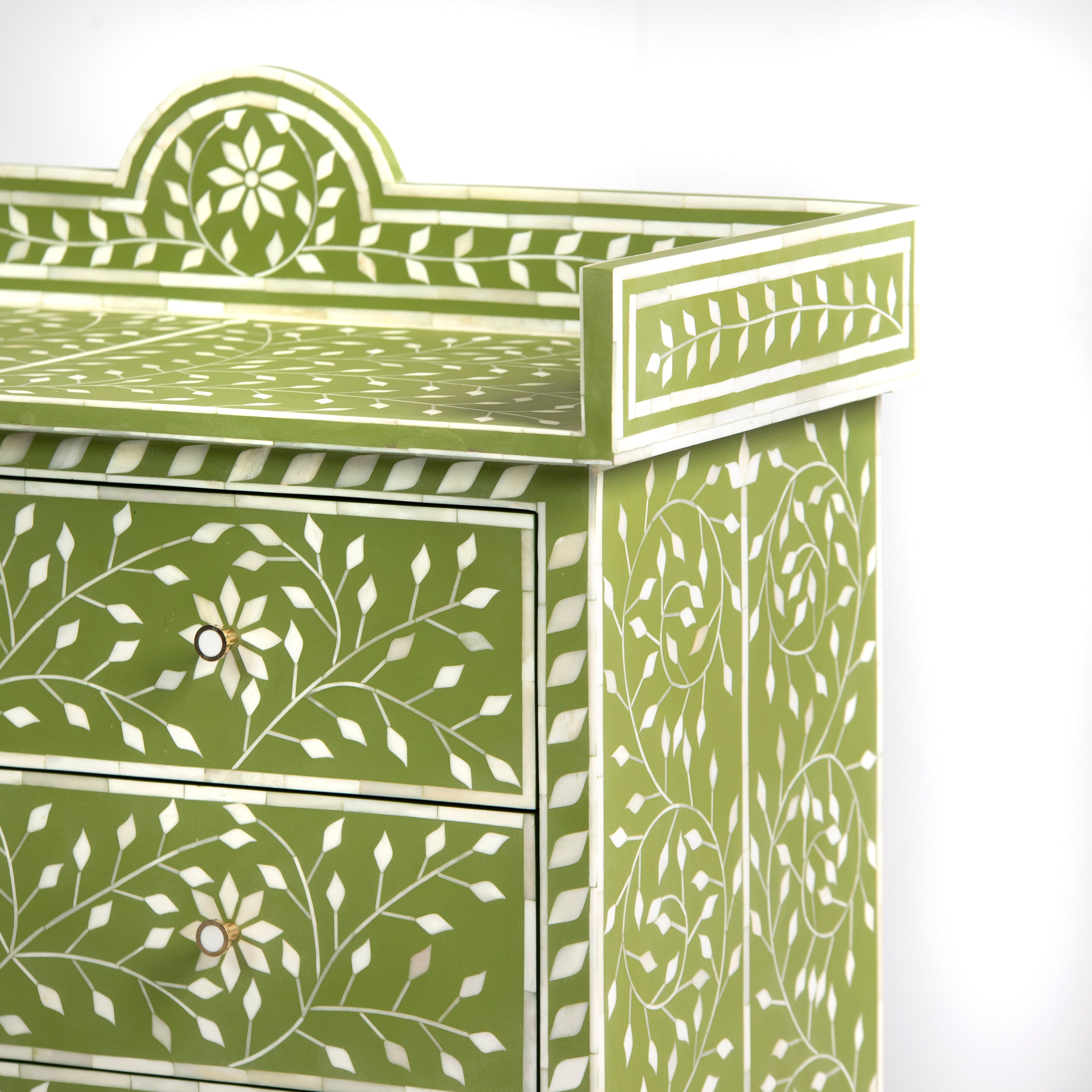 Bone inlay chest of drawers featuring intricate floral vine pattern in green and white, handcrafted furniture piece