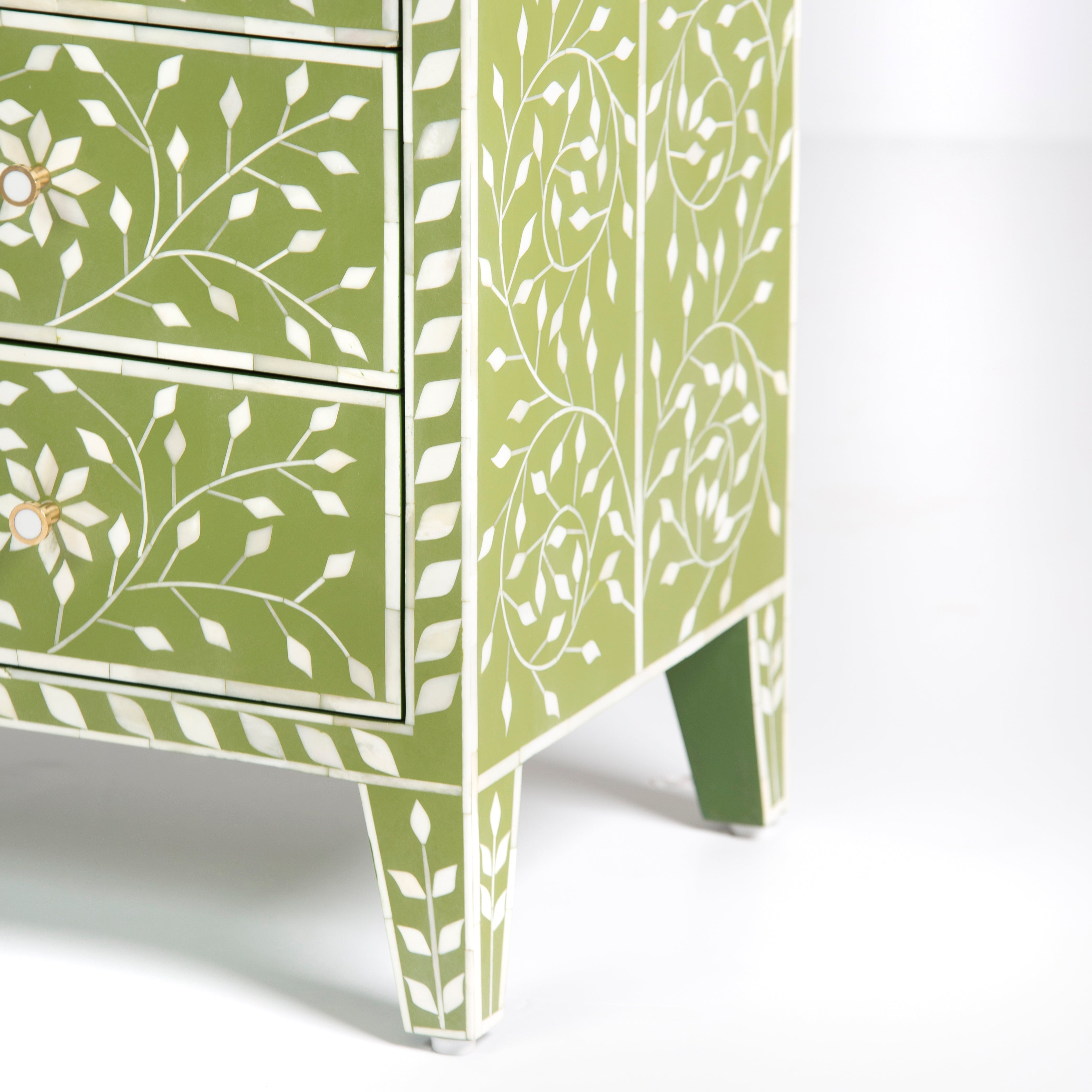 Bone inlay chest of drawers featuring intricate floral vine pattern in green and white, handcrafted furniture piece