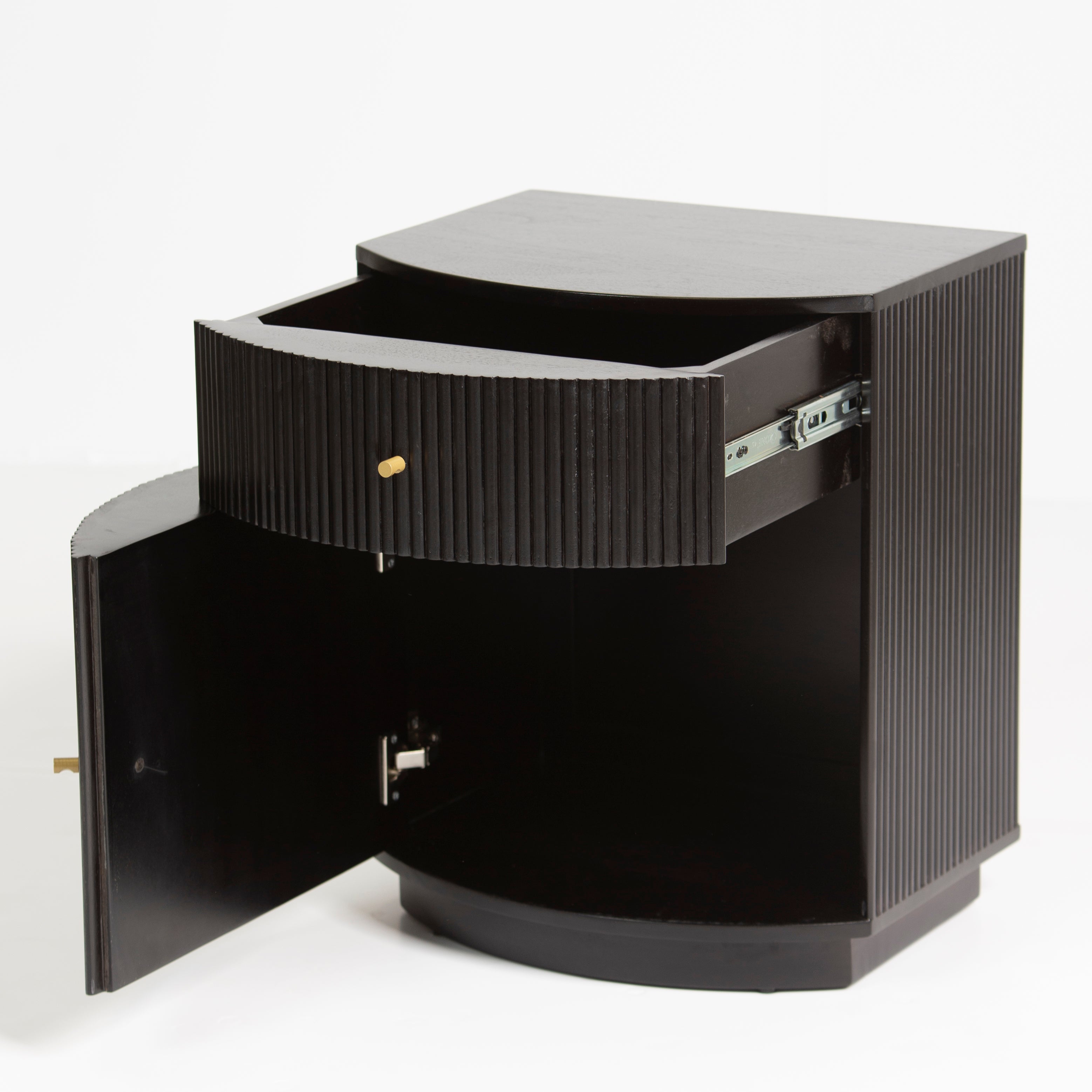 Wooden side drawer featuring fluted texture in black with brass accents, handcrafted furniture piece