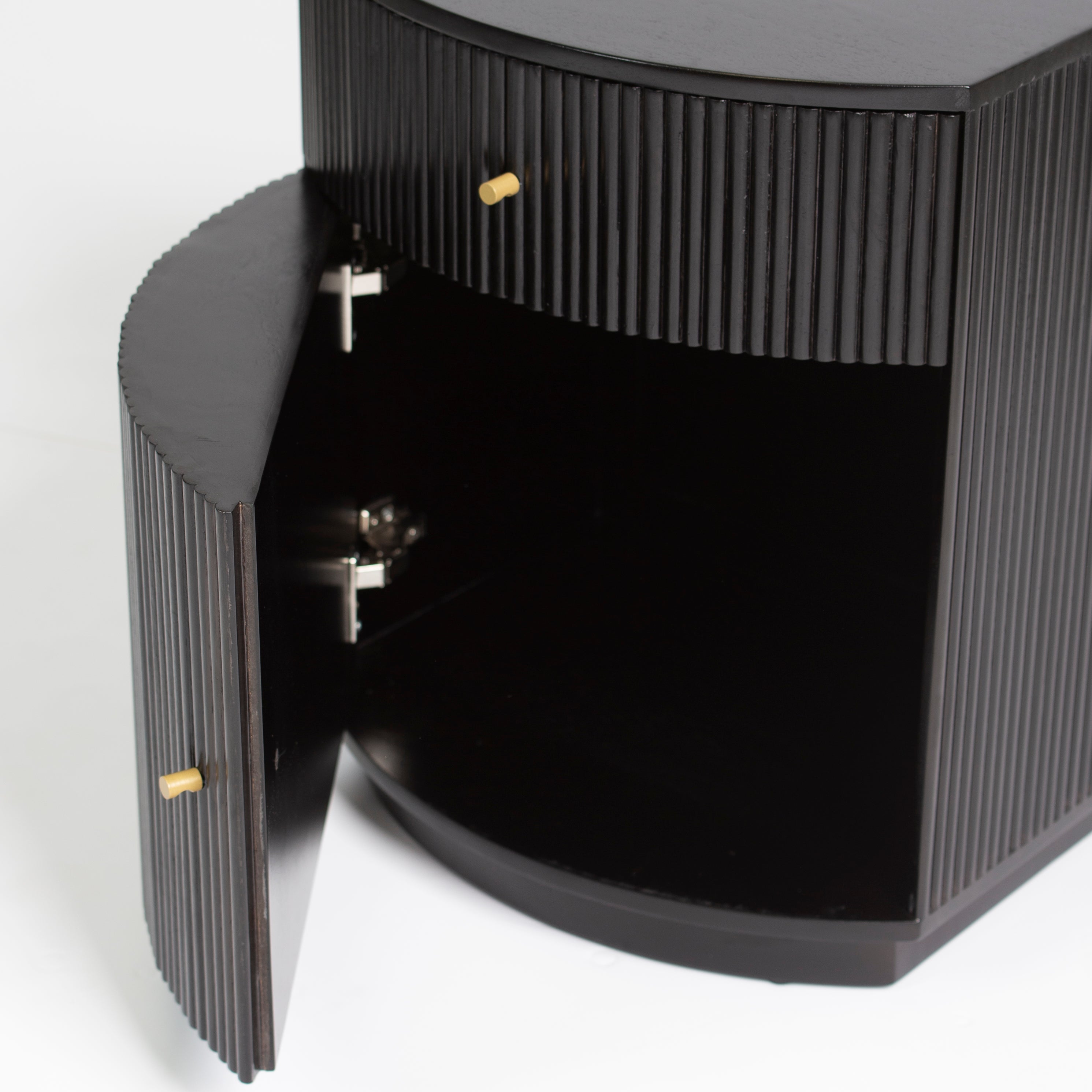 Wooden side drawer featuring fluted texture in black with brass accents, handcrafted furniture piece