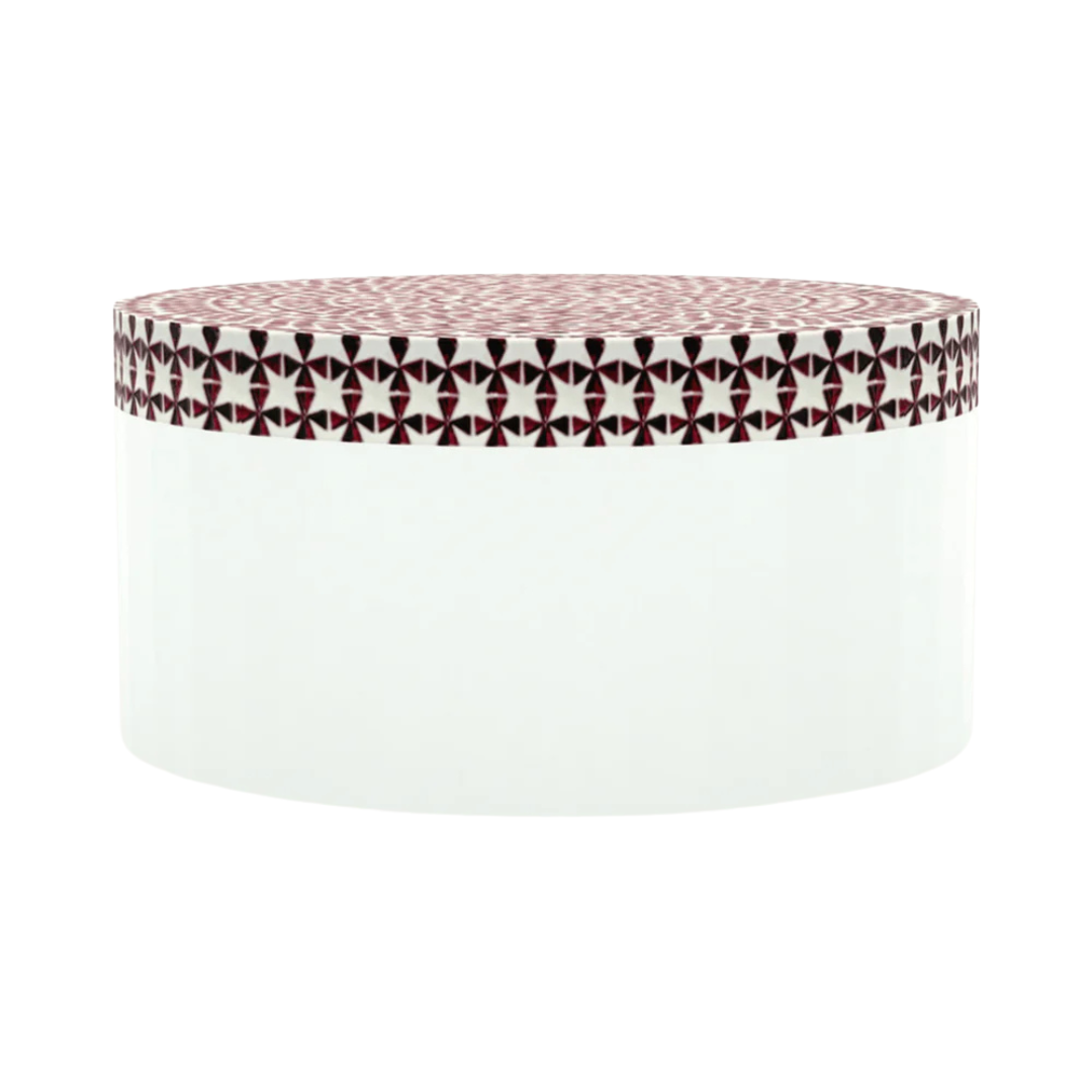 Round red bone inlay coffee table featuring a vibrant mosaic pattern on the top and sides. Perfect for modern and eclectic interiors.