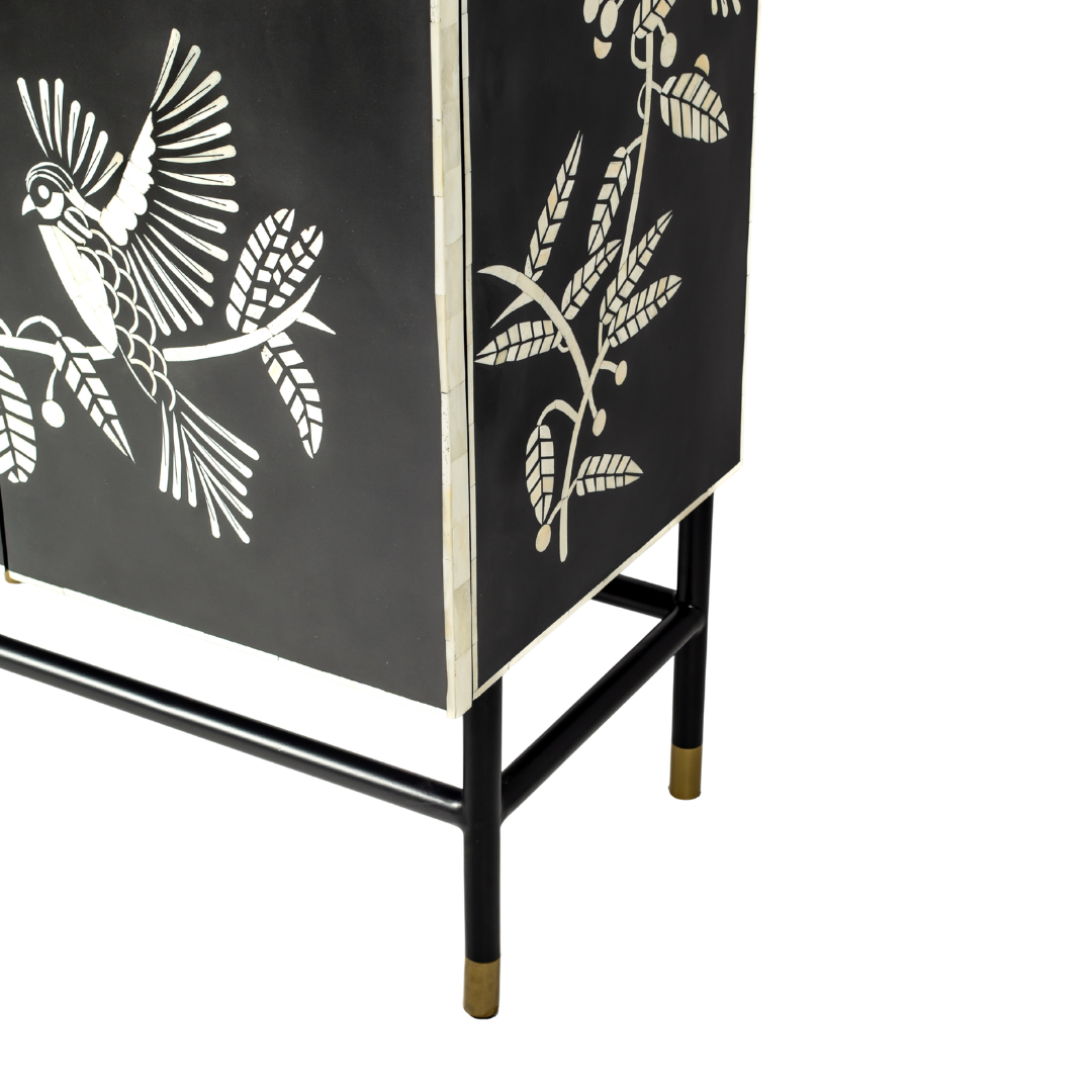 Handcrafted white bone inlay cabinet by Tabeer Homes, featuring bird and leaf motifs on mango wood with brass handles and global delivery.