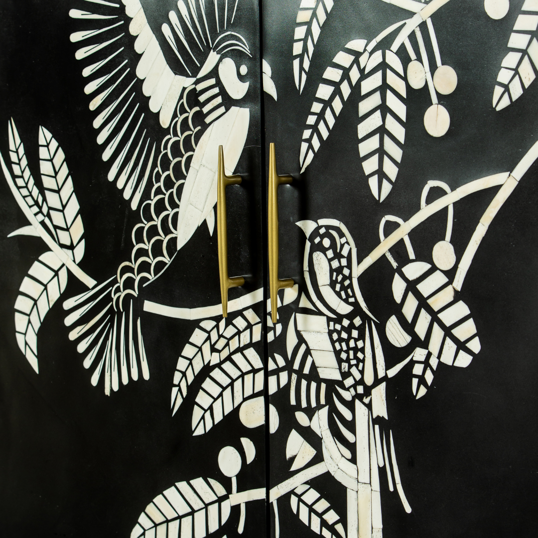 Handcrafted white bone inlay cabinet by Tabeer Homes, featuring bird and leaf motifs on mango wood with brass handles and global delivery.