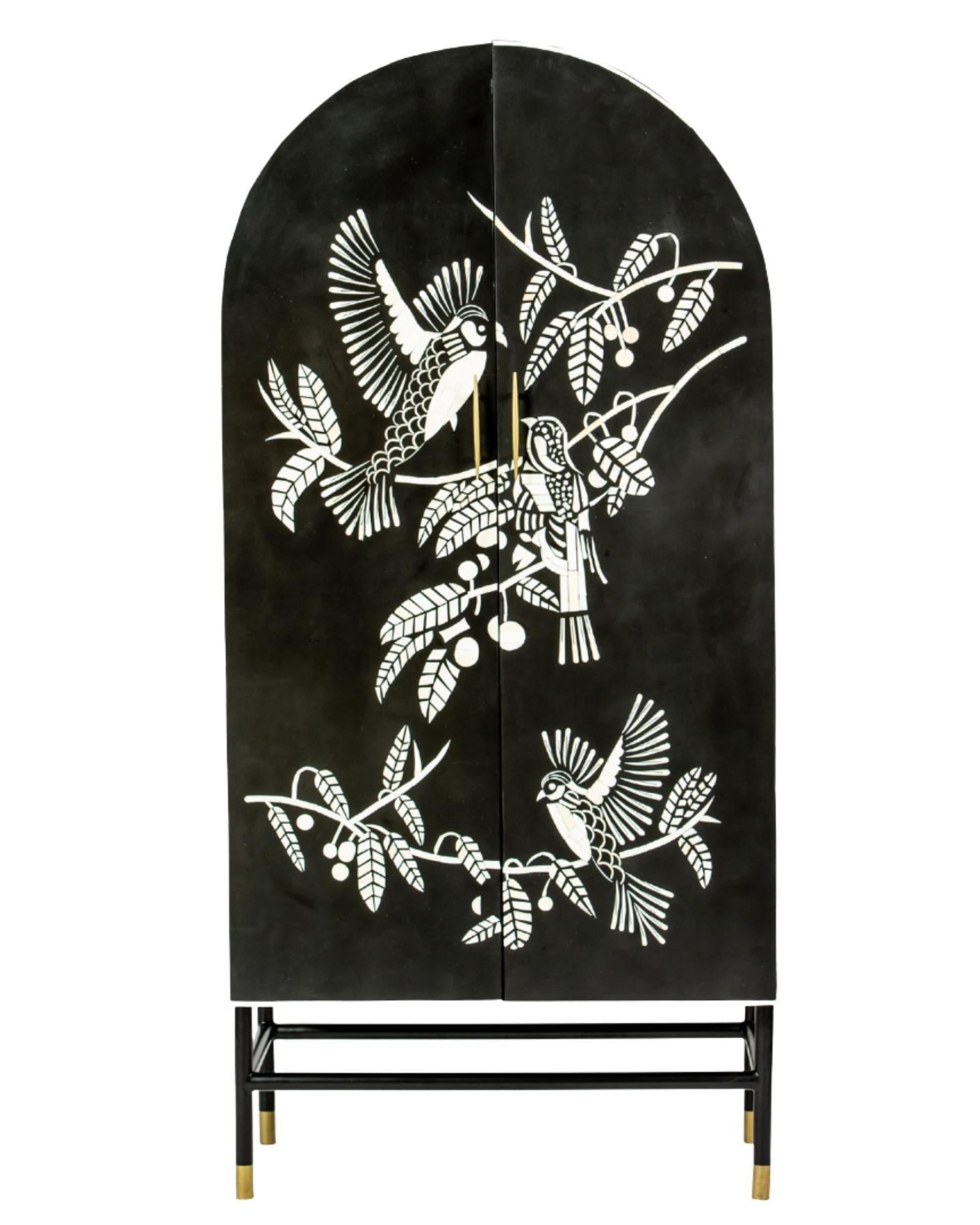 Handcrafted white bone inlay cabinet by Tabeer Homes, featuring bird and leaf motifs on mango wood with brass handles and global delivery.