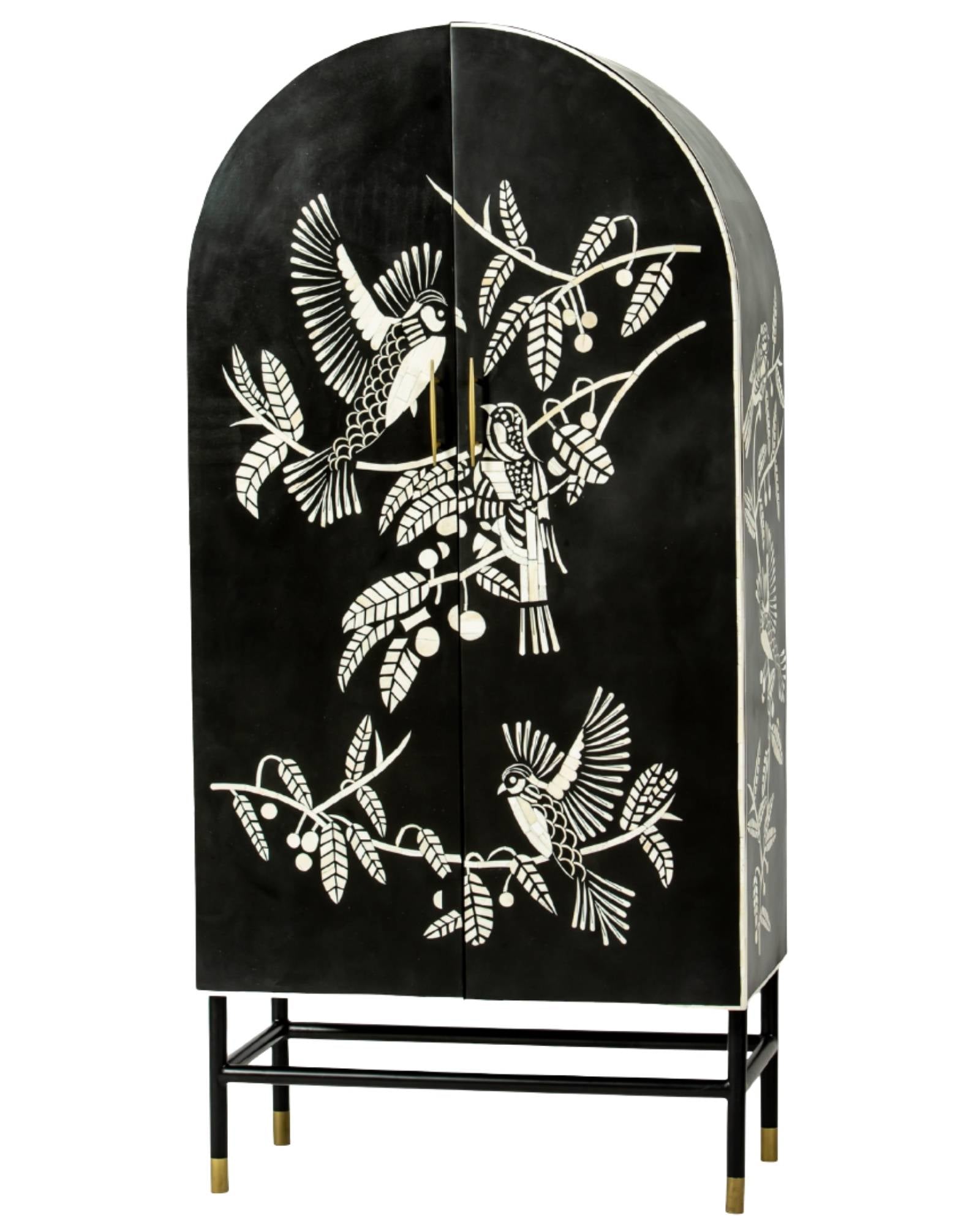 Handcrafted white bone inlay cabinet by Tabeer Homes, featuring bird and leaf motifs on mango wood with brass handles and global delivery.