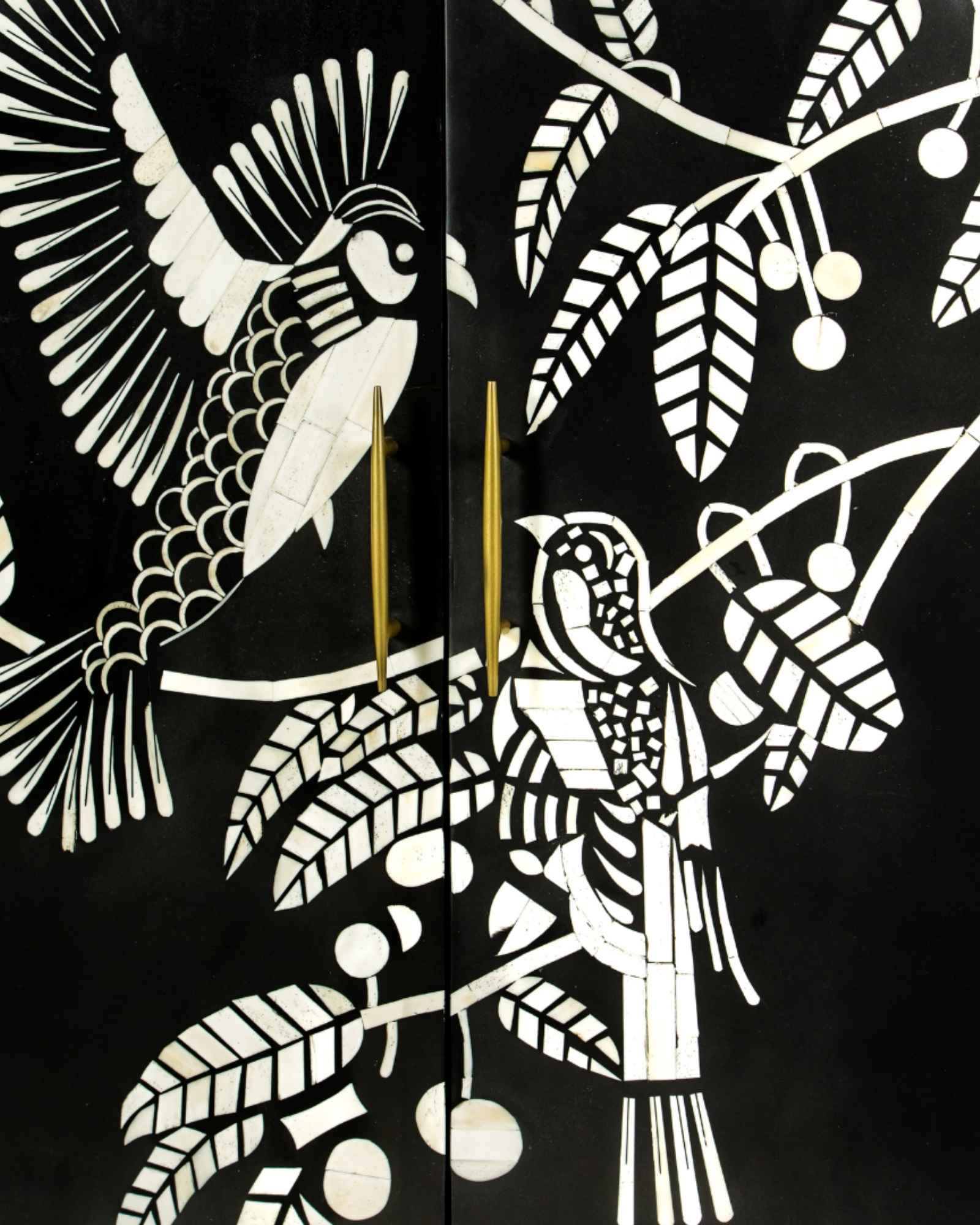 Handcrafted white bone inlay cabinet by Tabeer Homes, featuring bird and leaf motifs on mango wood with brass handles and global delivery.