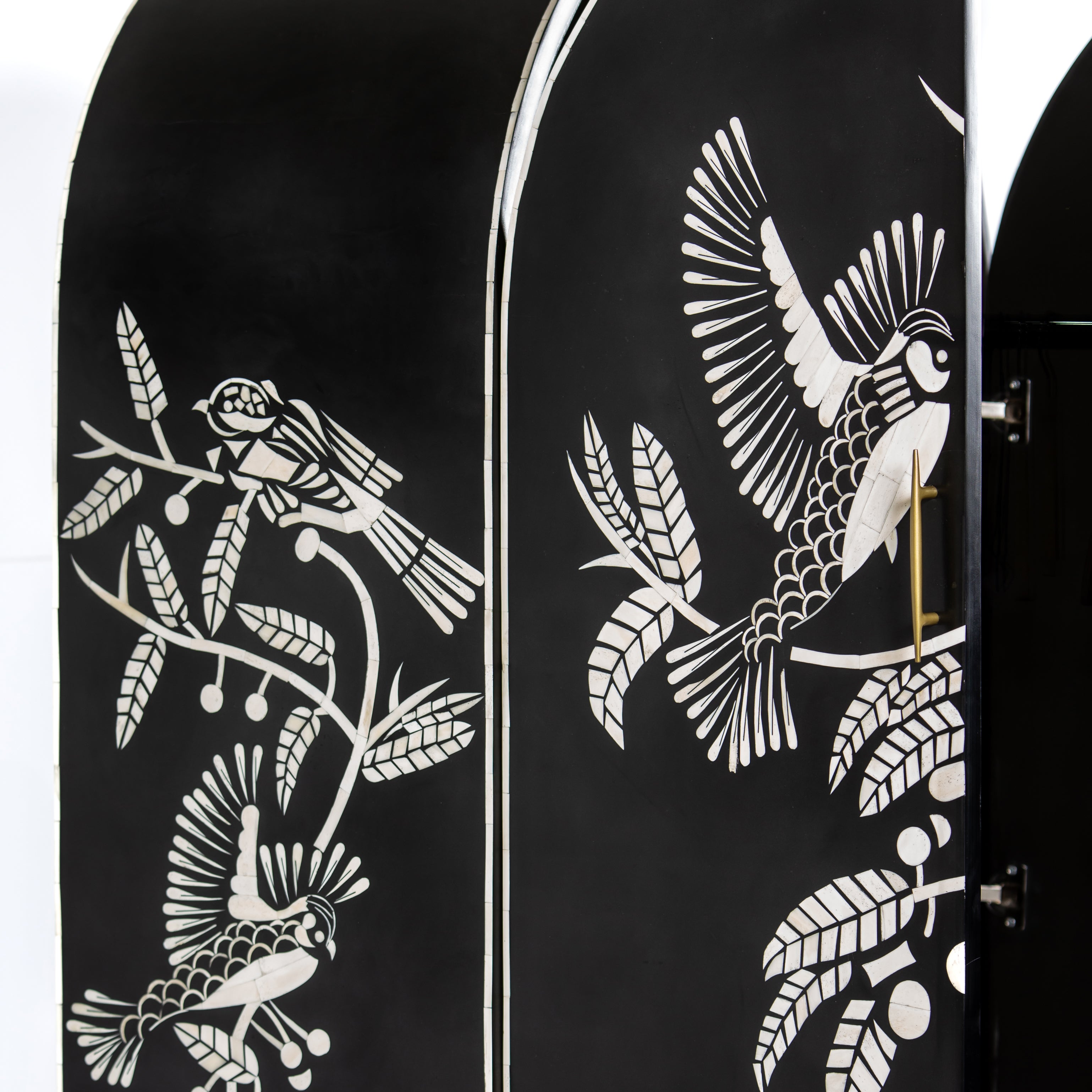 Handcrafted white bone inlay cabinet by Tabeer Homes, featuring bird and leaf motifs on mango wood with brass handles and global delivery.