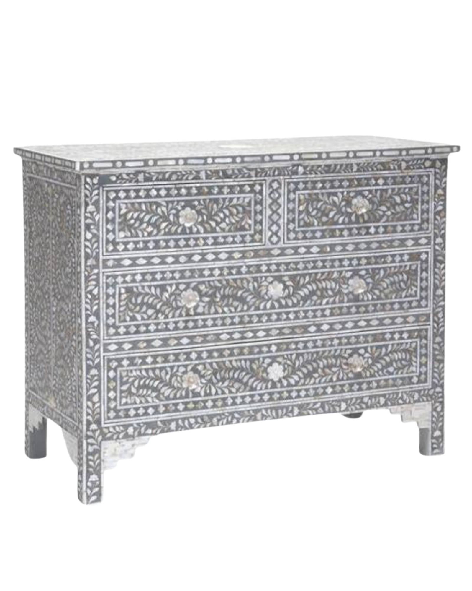 Featuring a Grey Mother of Pearl Inlay Chest of Drawer in floral pattern, the Iris collection enhances your space with intricately handcrafted designs that elevate your home and living aesthetics.
