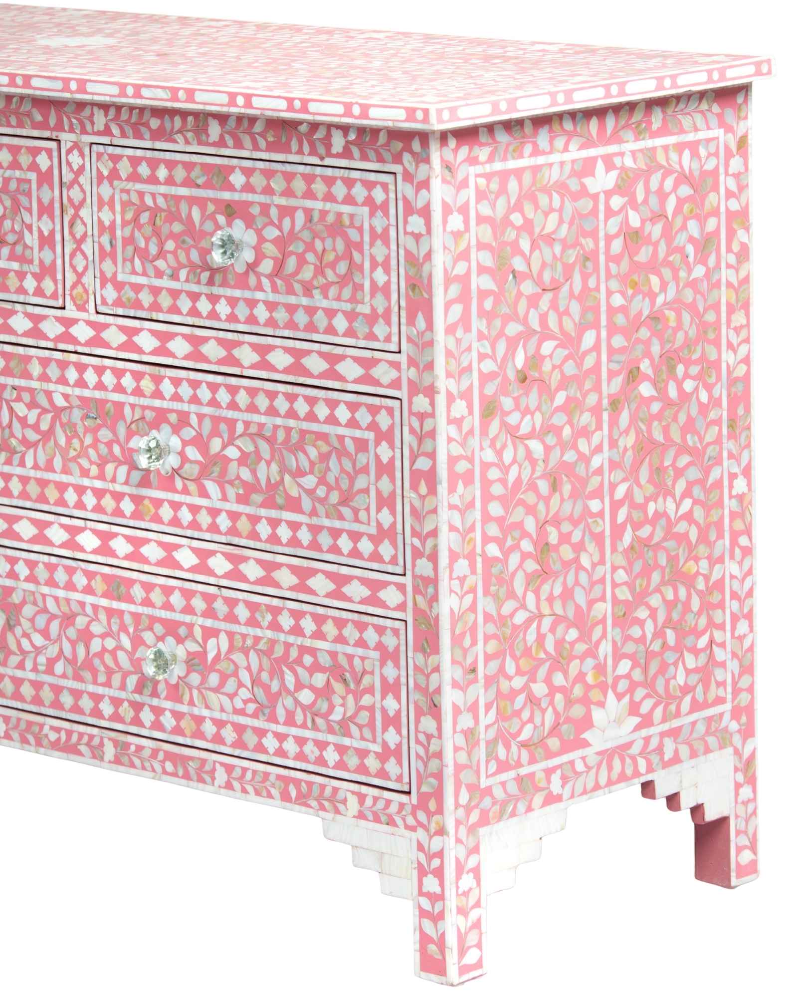 Mother of pearl inlay chest of drawers featuring intricate floral pattern in pink and white, handcrafted furniture piece