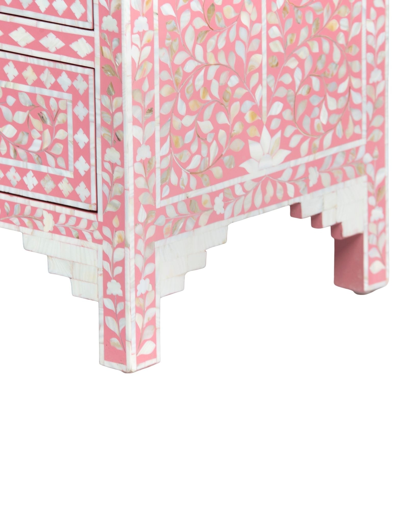 Mother of pearl inlay chest of drawers featuring intricate floral pattern in pink and white, handcrafted furniture piece