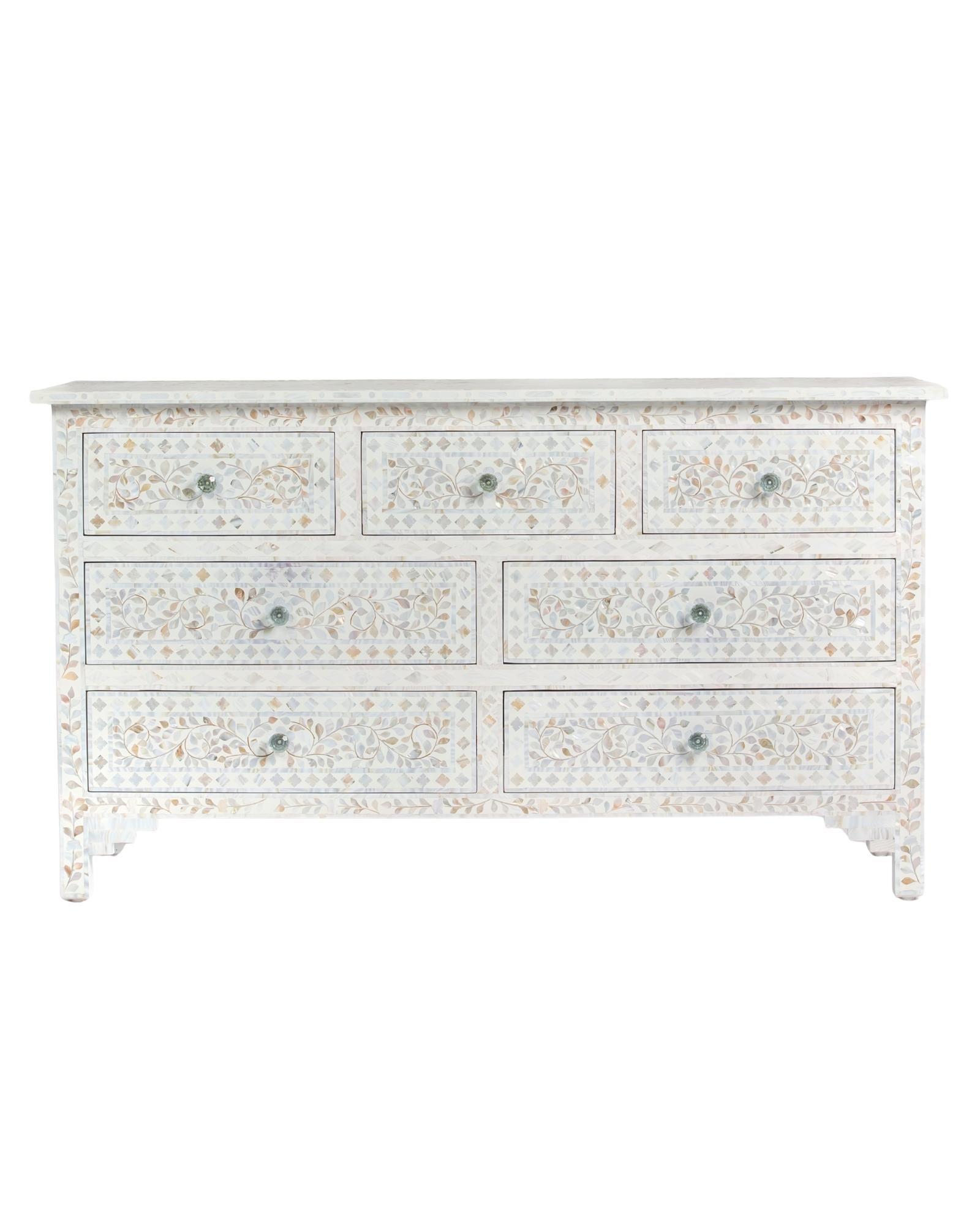 Mother of pearl inlay chest of drawers featuring intricate floral pattern in white and multitone, handcrafted furniture piece.