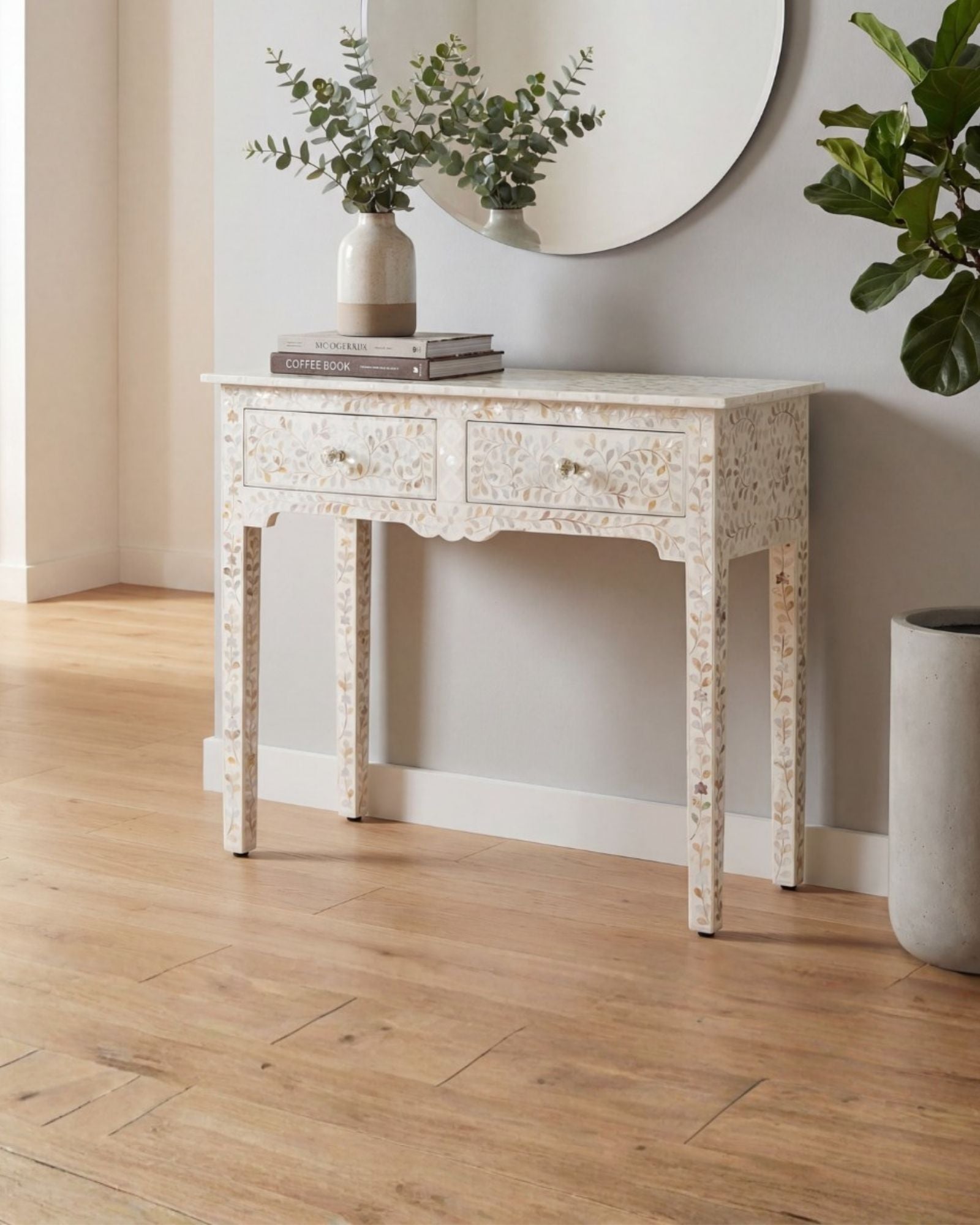 White mother of pearl inlay console with curved fully inlaid base, handcrafted with seamless iridescent detailing.
