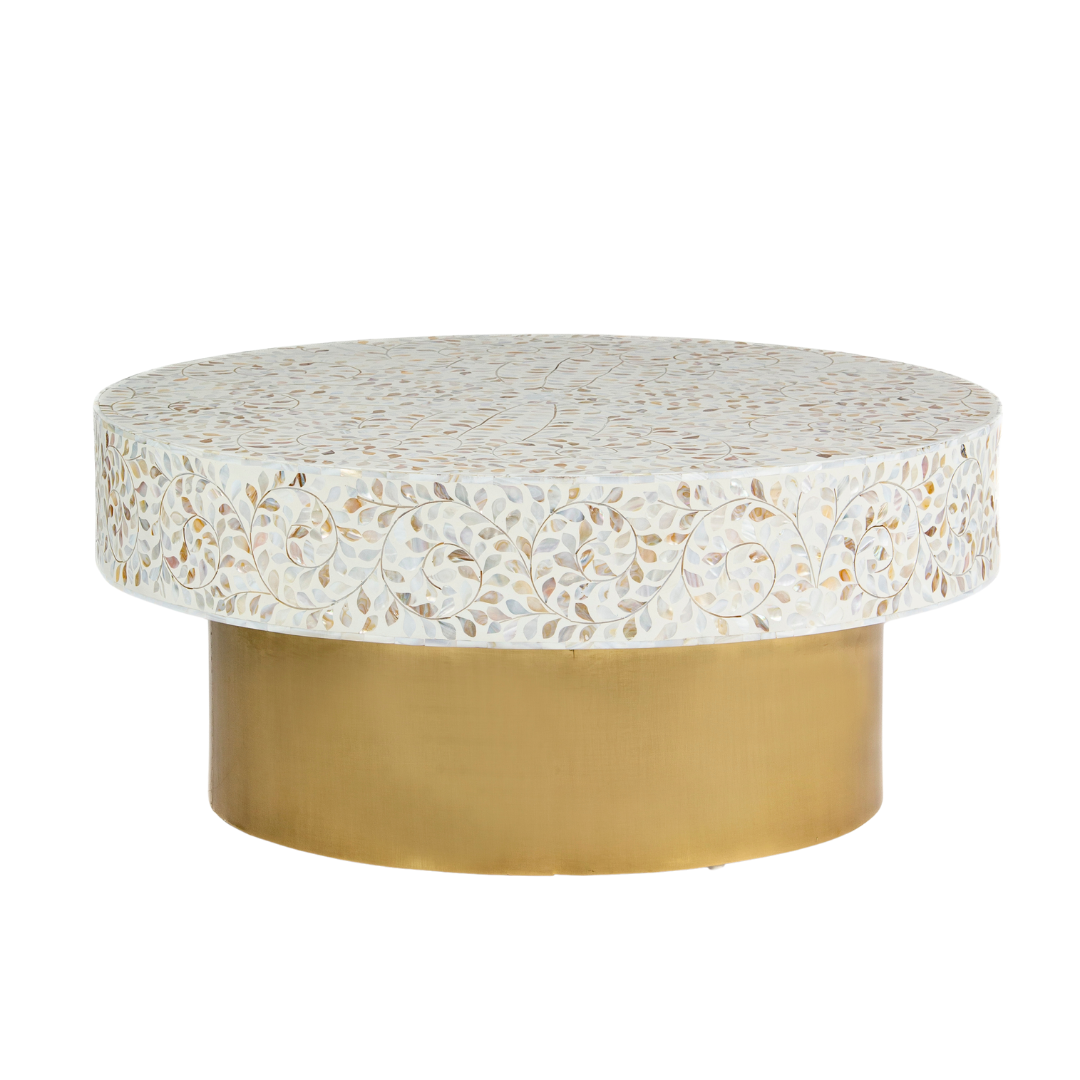 White mother of pearl inlay coffee table featuring intricate floral vine design and brushed gold cylindrical base by Tabeer Homes.