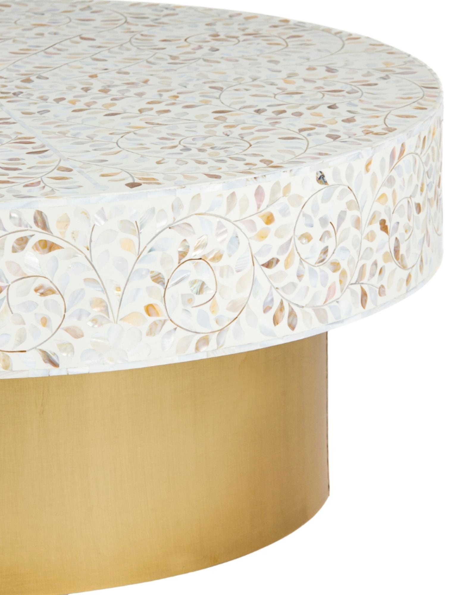 White mother of pearl inlay coffee table featuring intricate floral vine design and brushed gold cylindrical base by Tabeer Homes.