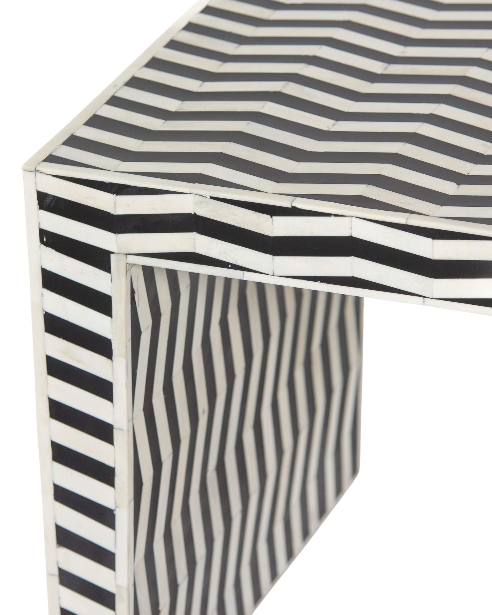 Handcrafted Isra side table featuring black bone inlay with geometric striped detailing and a compact cubic form.