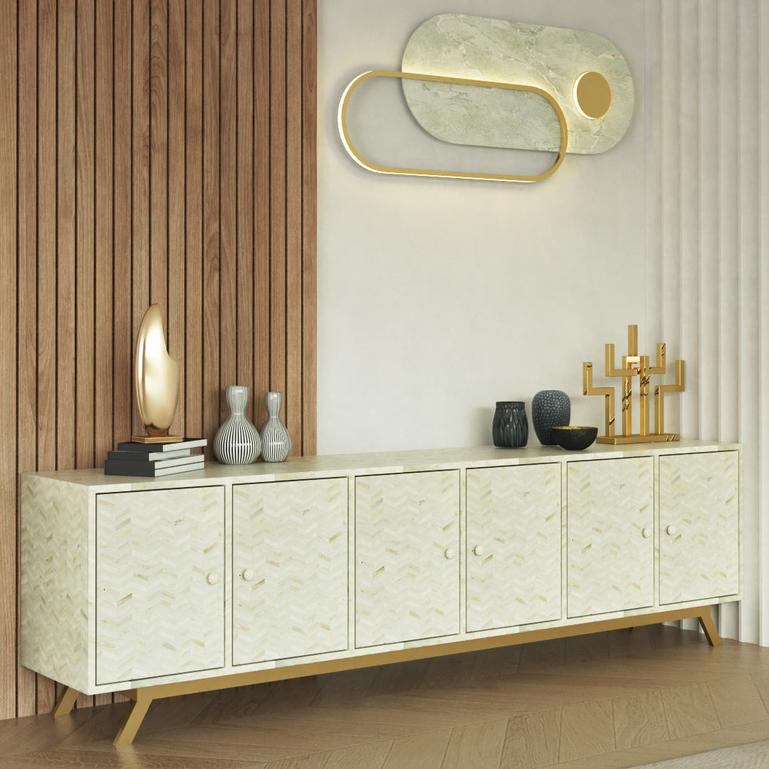 Handcrafted beige cabinet with intricate bone inlay, featuring a striped pattern and sleek metal legs. A luxurious storage solution for any space.