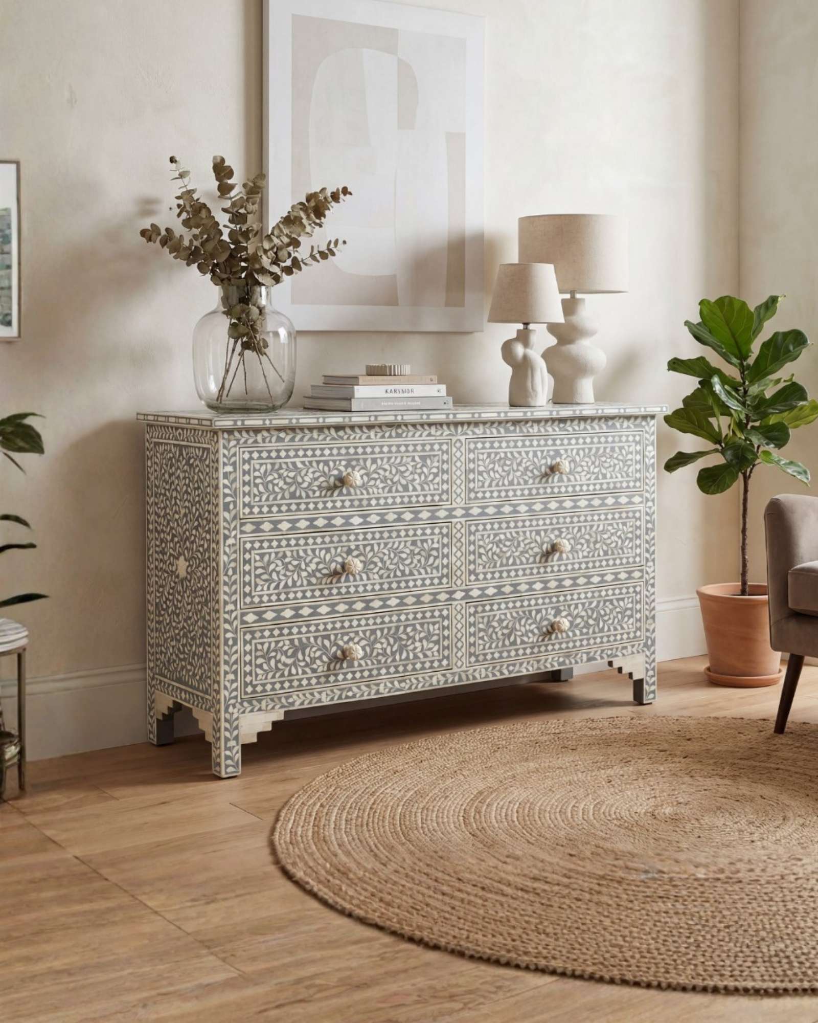 Bone inlay chest of drawers featuring intricate floral pattern in grey and white, handcrafted furniture piece.