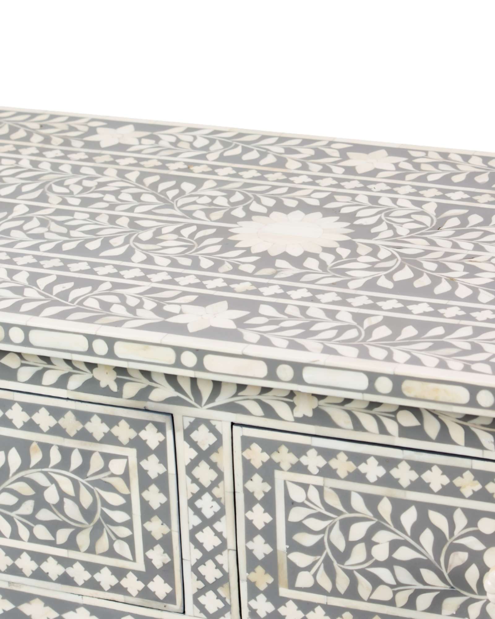 Featuring a Grey Bone Inlay Chest of Drawer in floral pattern, the Jade collection enhances your space with intricately handcrafted designs that elevate your home and living aesthetics.
