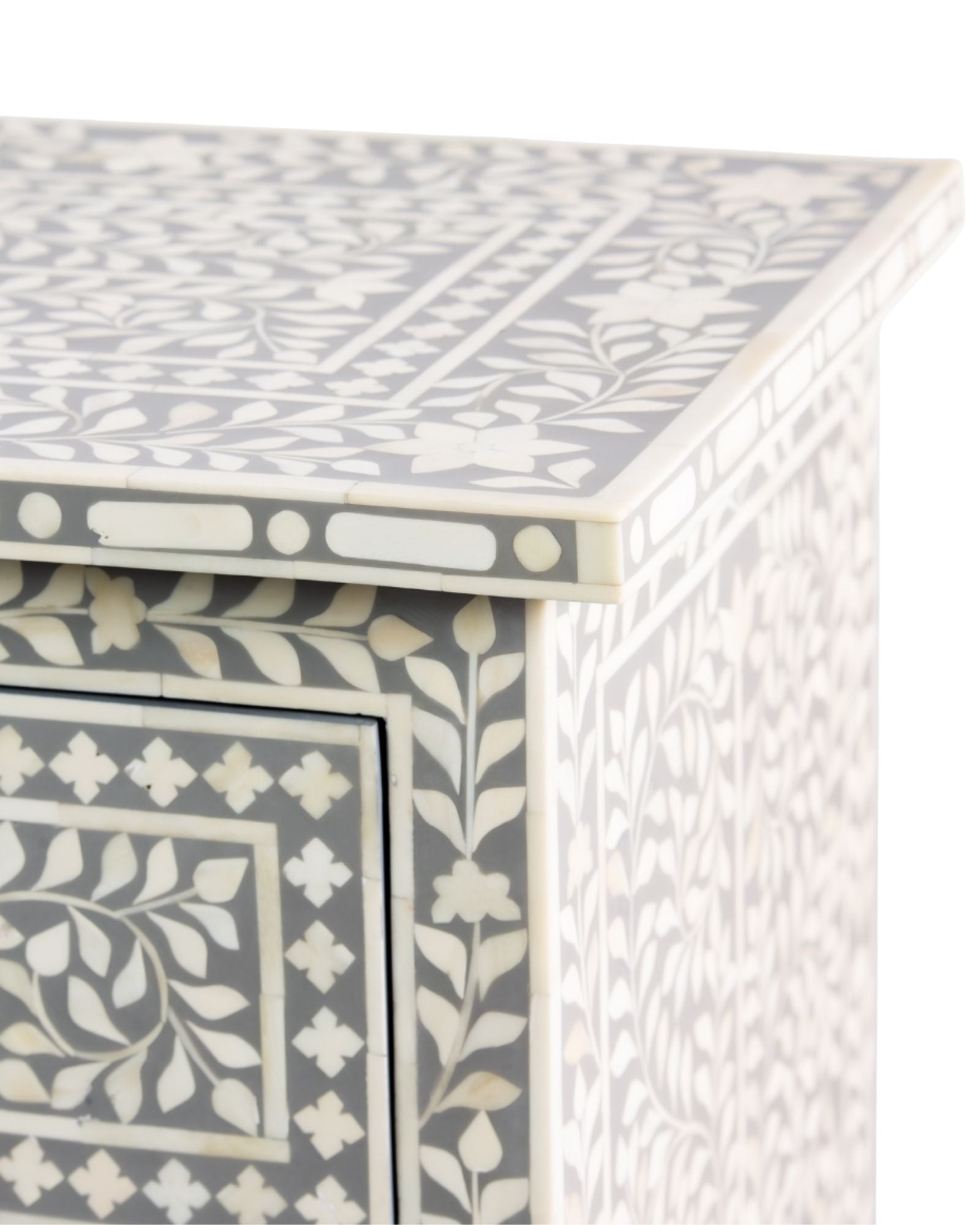 Featuring a Grey Bone Inlay Chest of Drawer in floral pattern, the Jade collection enhances your space with intricately handcrafted designs that elevate your home and living aesthetics.