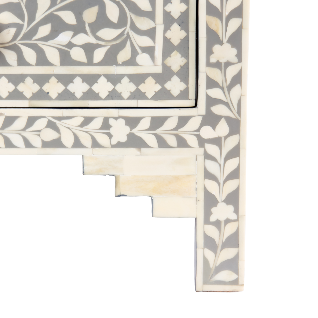 Featuring a Grey Bone Inlay Chest of Drawer in floral pattern, the Jade collection enhances your space with intricately handcrafted designs that elevate your home and living aesthetics.