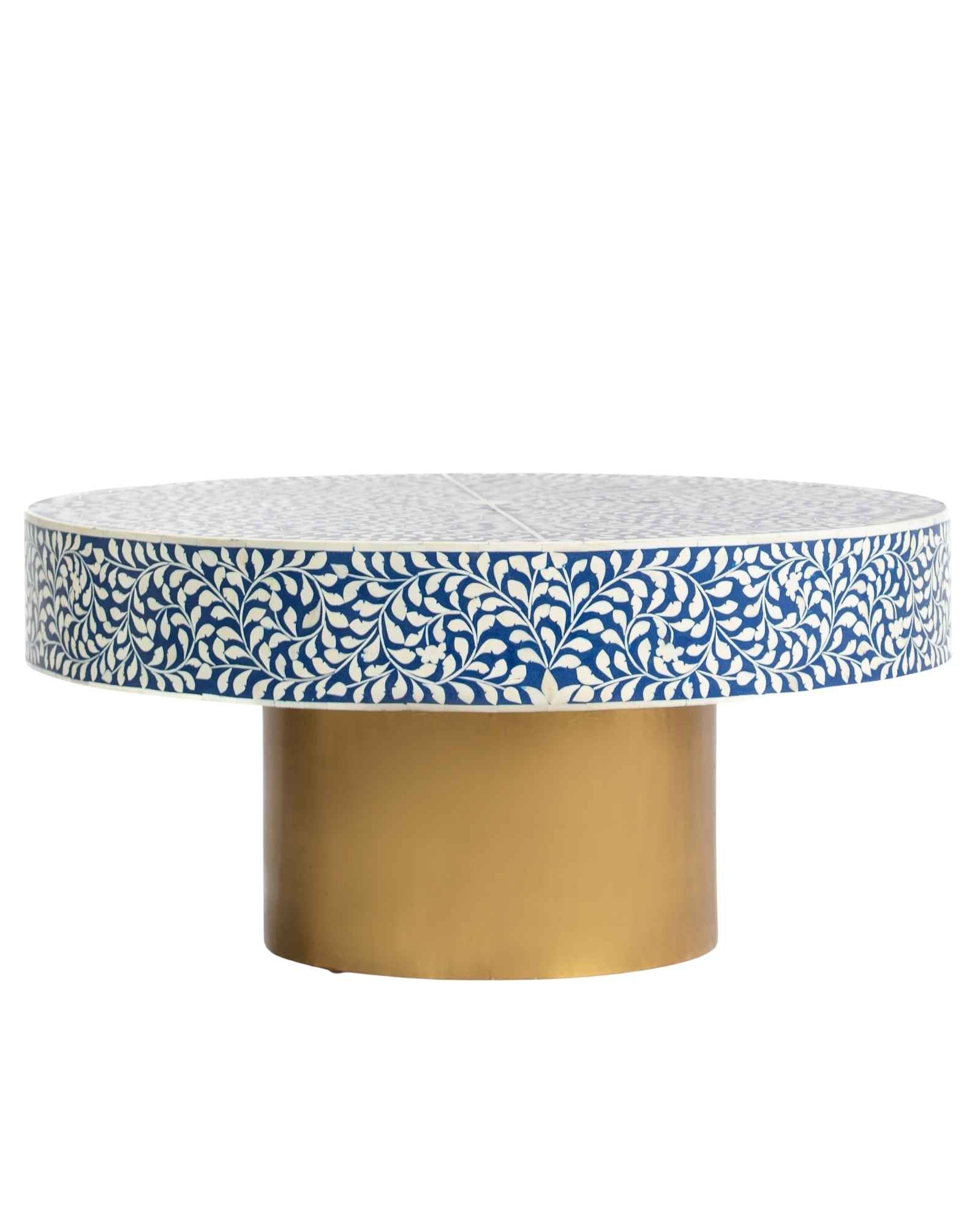 Bone inlay coffee table featuring intricate floral vine pattern in blue and white, handcrafted furniture piece.