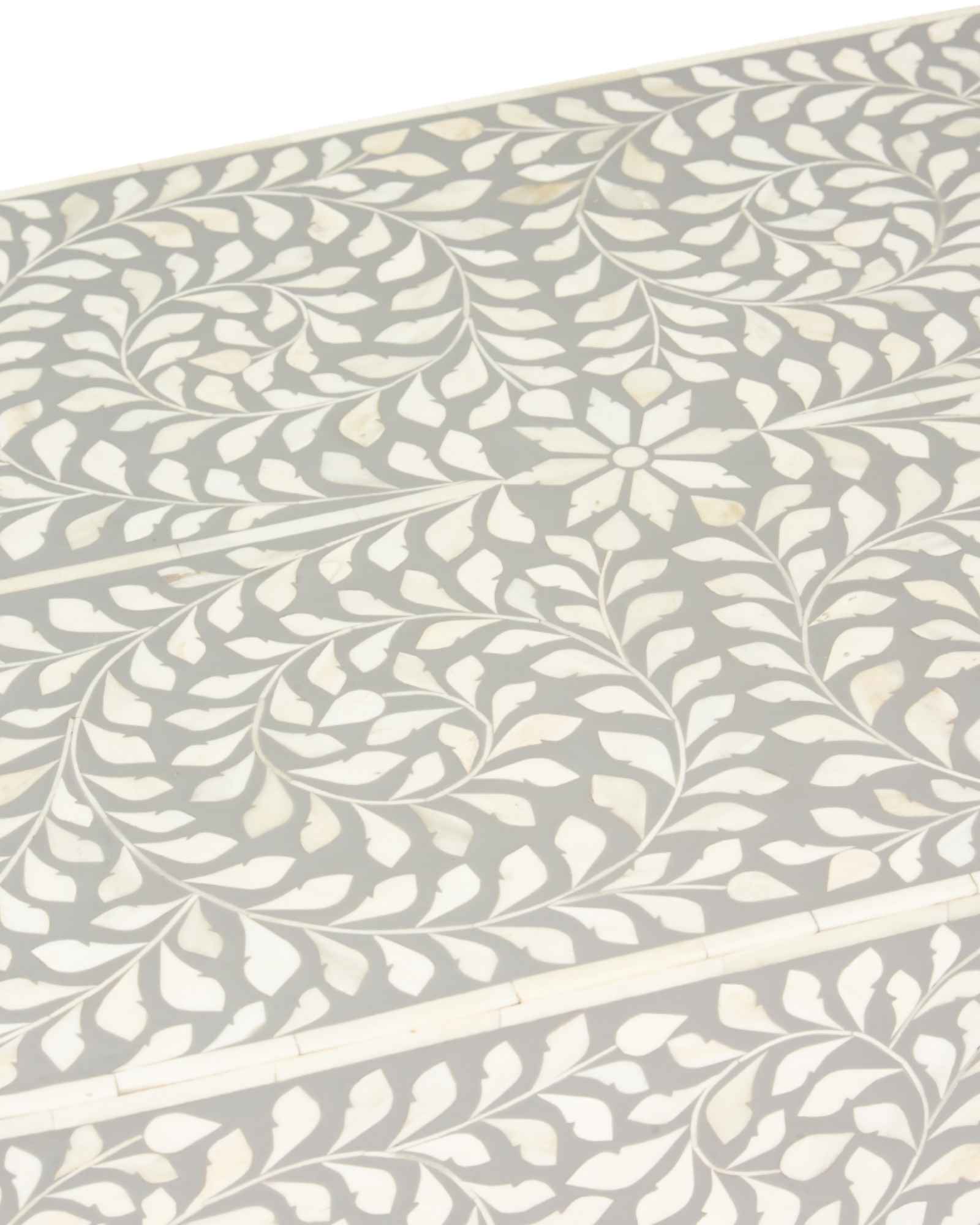 Elegant grey bone inlay coffee table with a gold base. Compact, handcrafted and eye-catching – a timeless addition to your space.