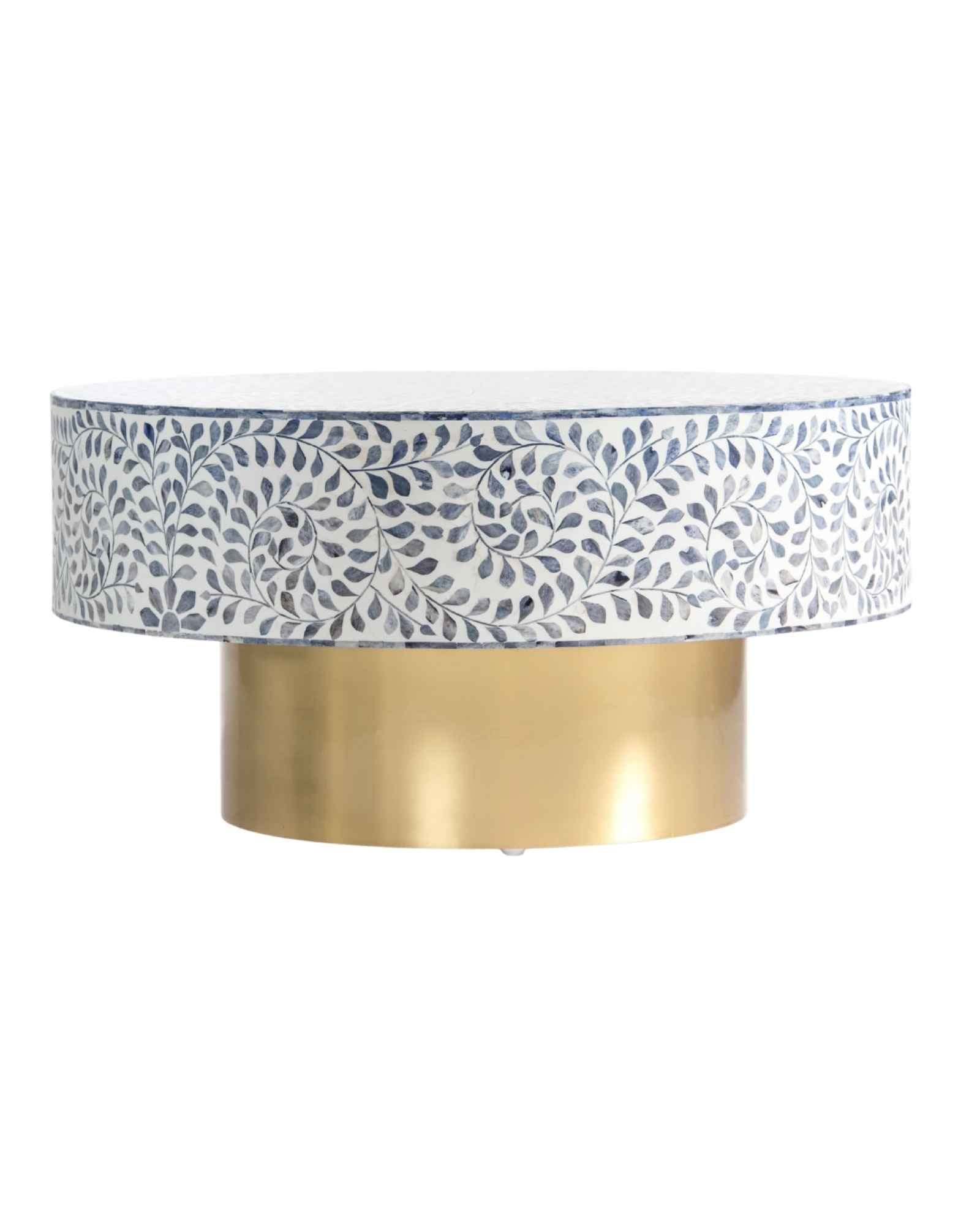Handcrafted Jade coffee table featuring intricate blue bone inlay detailing with a round silhouette and brushed brass base.