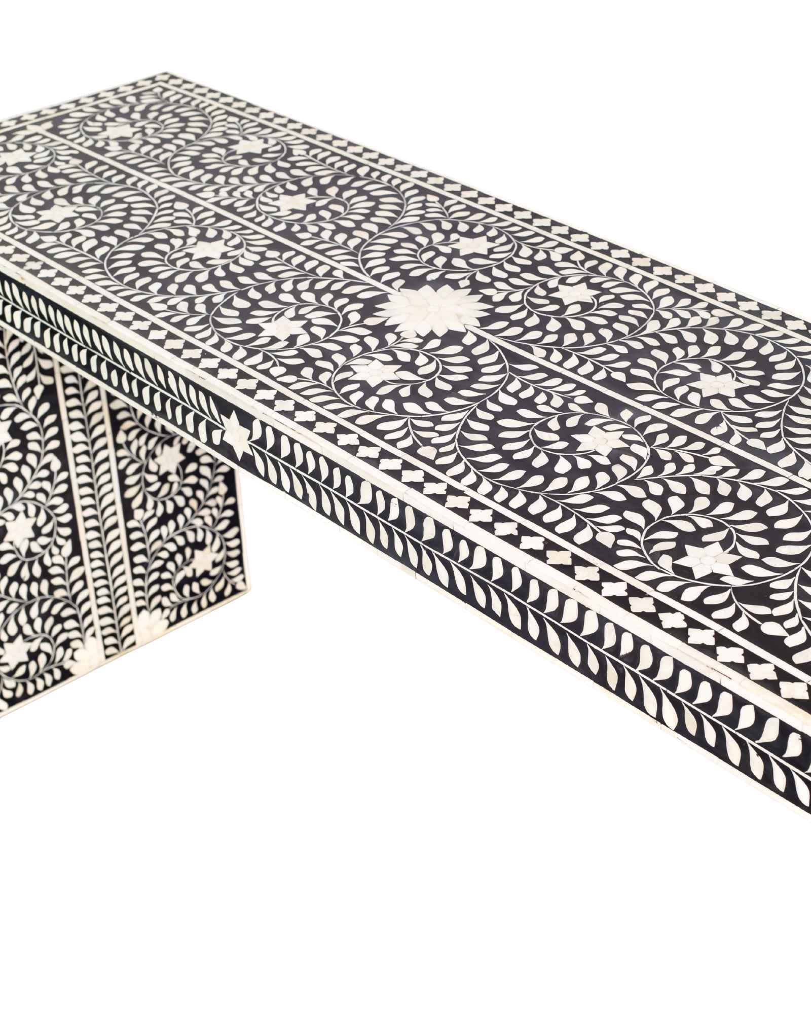 Black bone inlay console table with floral and vine motifs, handcrafted by artisans and finished with intricate detailing across the surface.