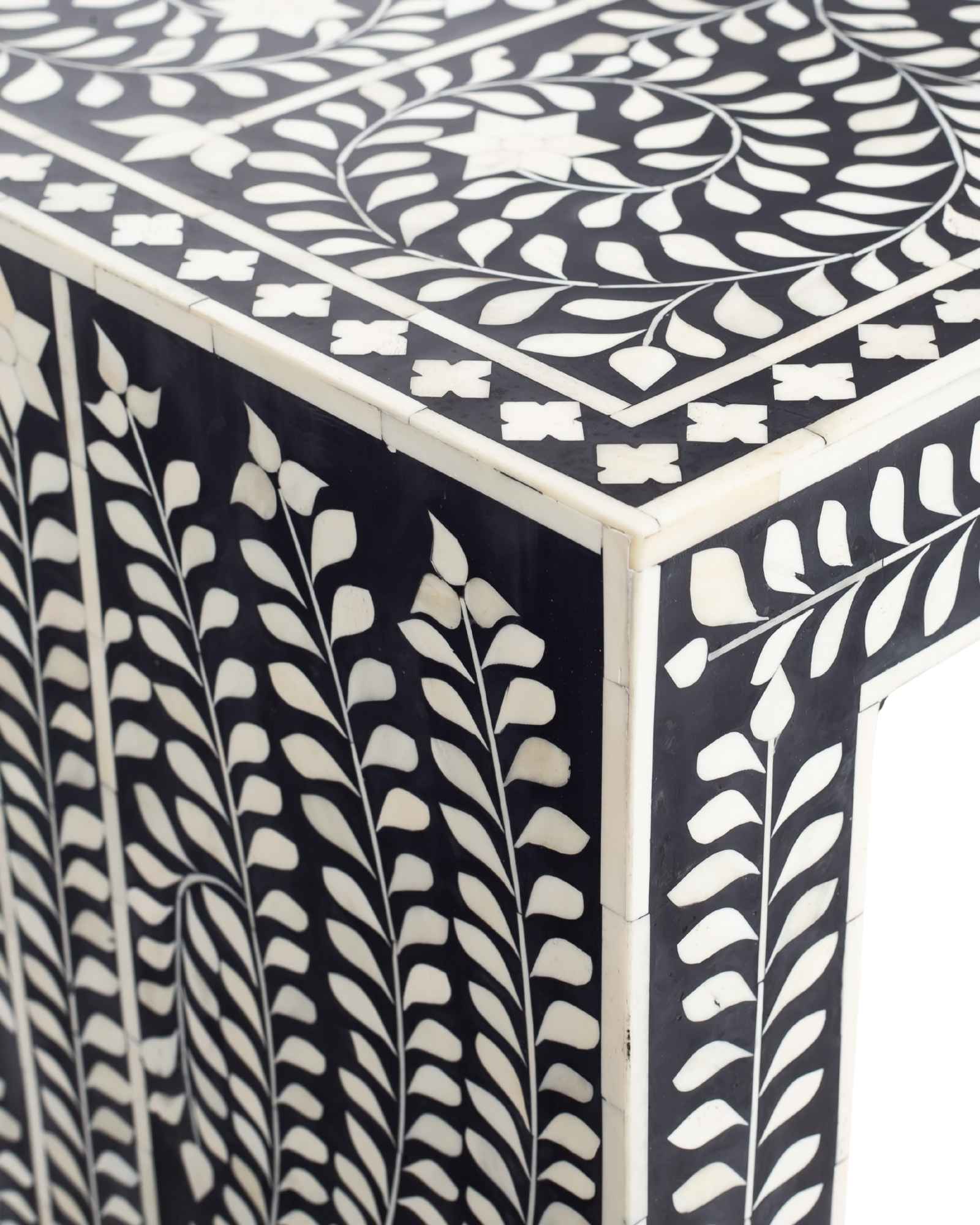 Black bone inlay console table with floral and vine motifs, handcrafted by artisans and finished with intricate detailing across the surface.