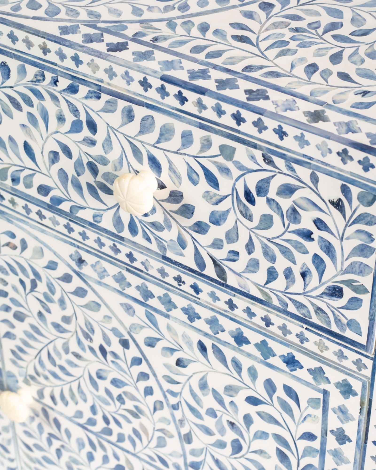 Featuring a beautiful floral sideboard in Dyed Blue Bone Inlay with intricate hand inlaid work. Part of the Jade Collection - this buffet can be used as at an entryway or as a cutlery storage unit.