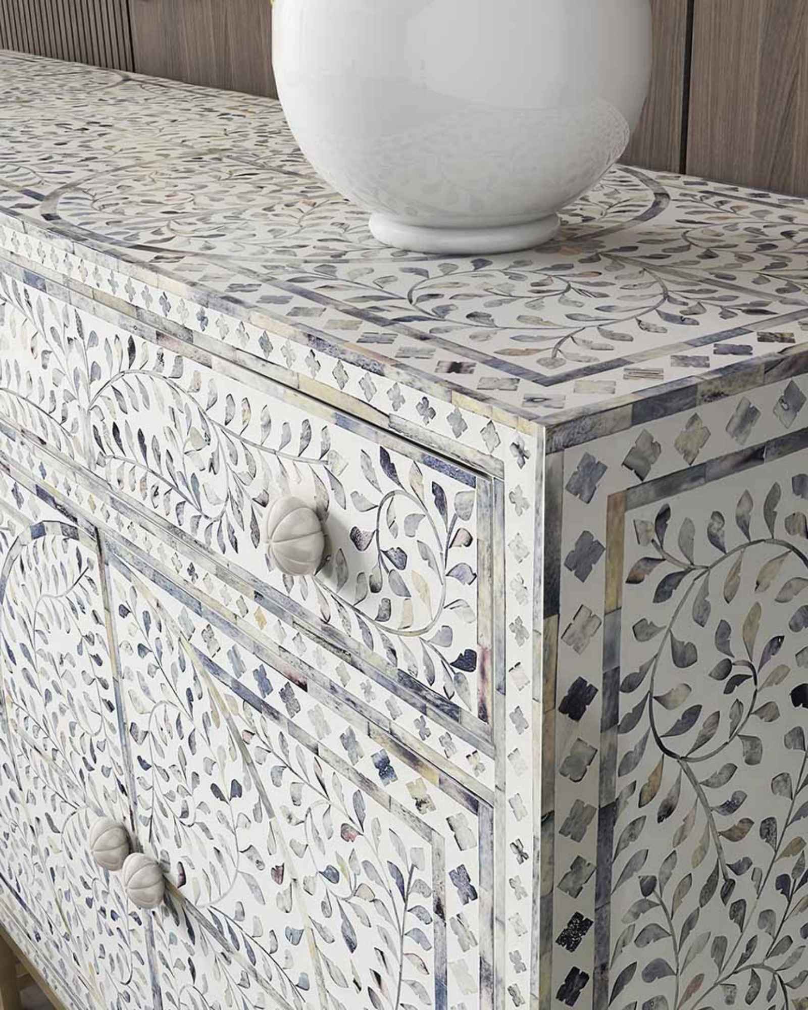 Featuring a beautiful floral sideboard in Dyed Blue Bone Inlay with intricate hand inlaid work. Part of the Jade Collection - this buffet can be used as at an entryway or as a cutlery storage unit.