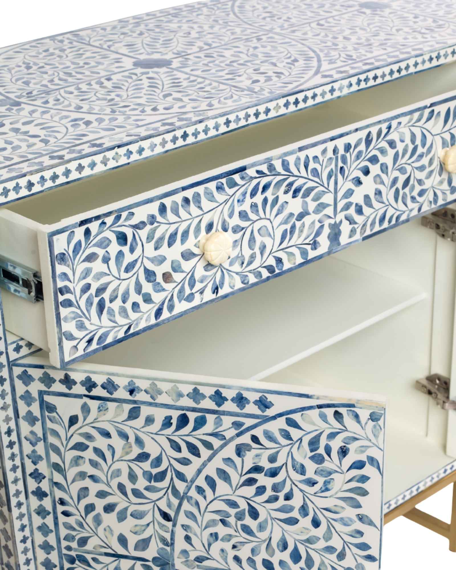 Featuring a beautiful floral sideboard in Dyed Blue Bone Inlay with intricate hand inlaid work. Part of the Jade Collection - this buffet can be used as at an entryway or as a cutlery storage unit.