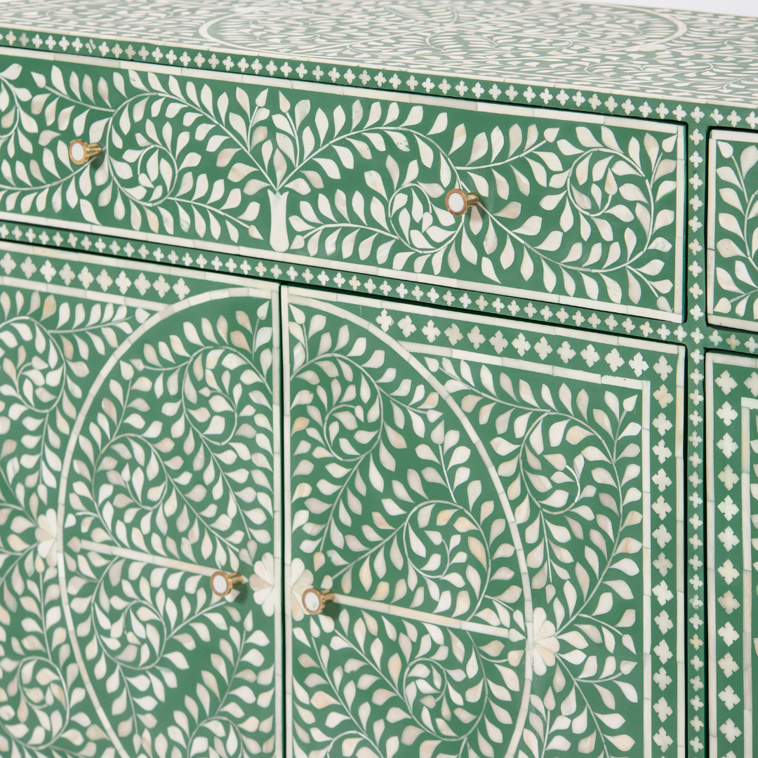 Featuring a beautiful floral sideboard in Green Bone Inlay with intricate hand inlaid work. Part of the Jade Collection - this buffet can be used as at an entryway or as a cutlery storage unit.