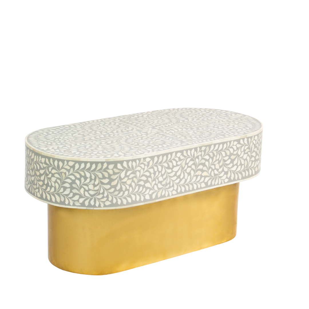 Elegant grey bone inlay coffee table with a gold base. Compact, handcrafted and eye-catching – a timeless addition to your space.