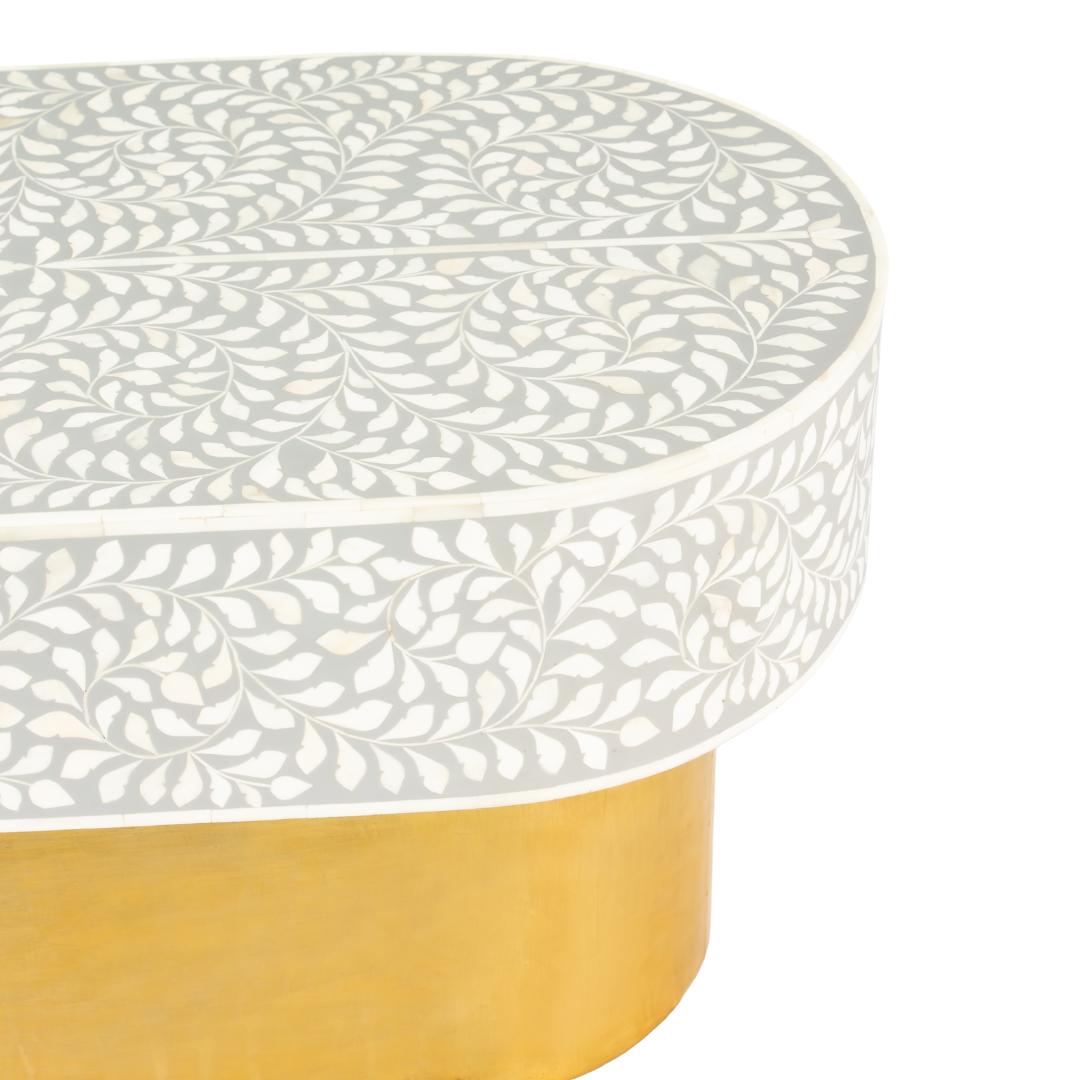 Elegant grey bone inlay coffee table with a gold base. Compact, handcrafted and eye-catching – a timeless addition to your space.