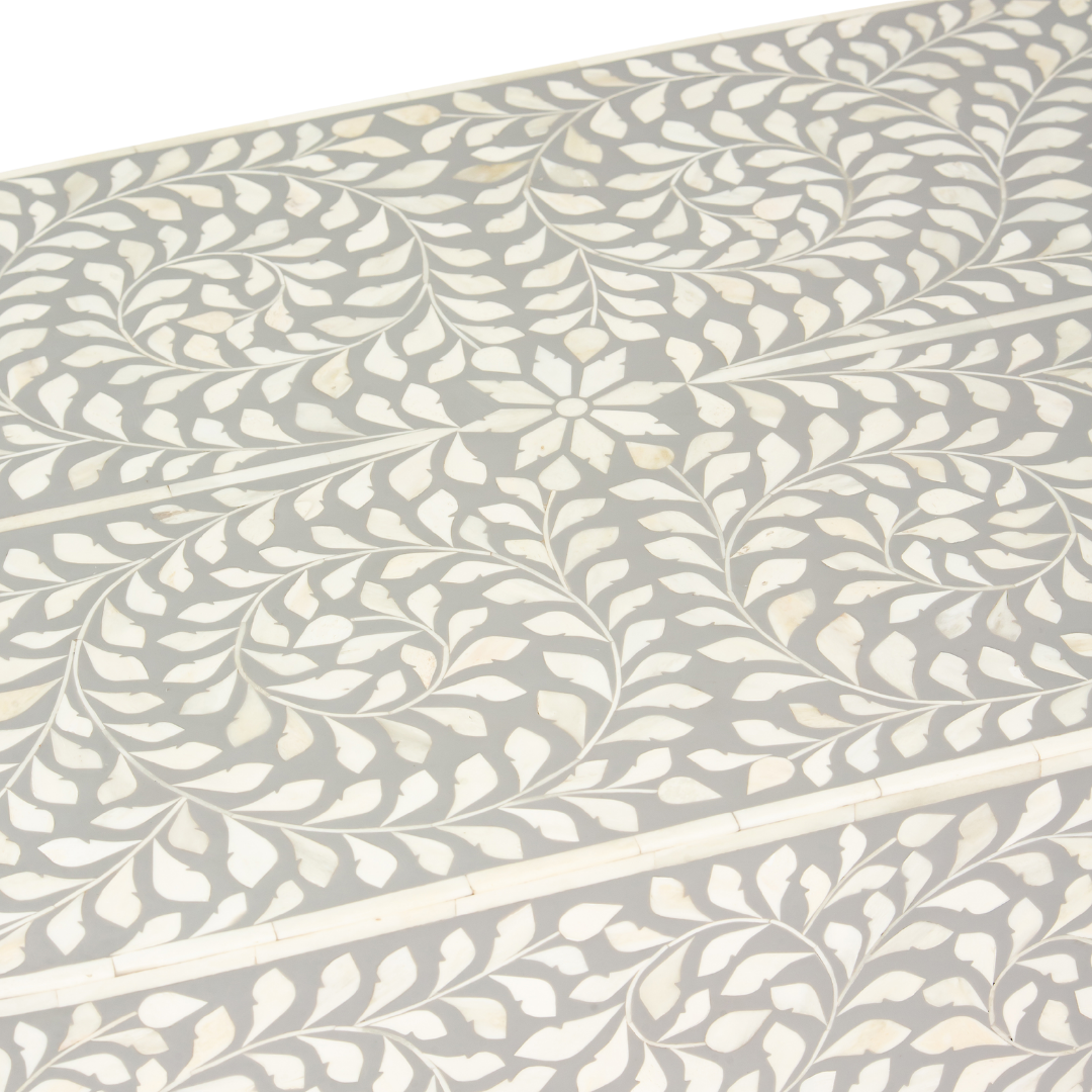 Elegant grey bone inlay coffee table with a gold base. Compact, handcrafted and eye-catching – a timeless addition to your space.