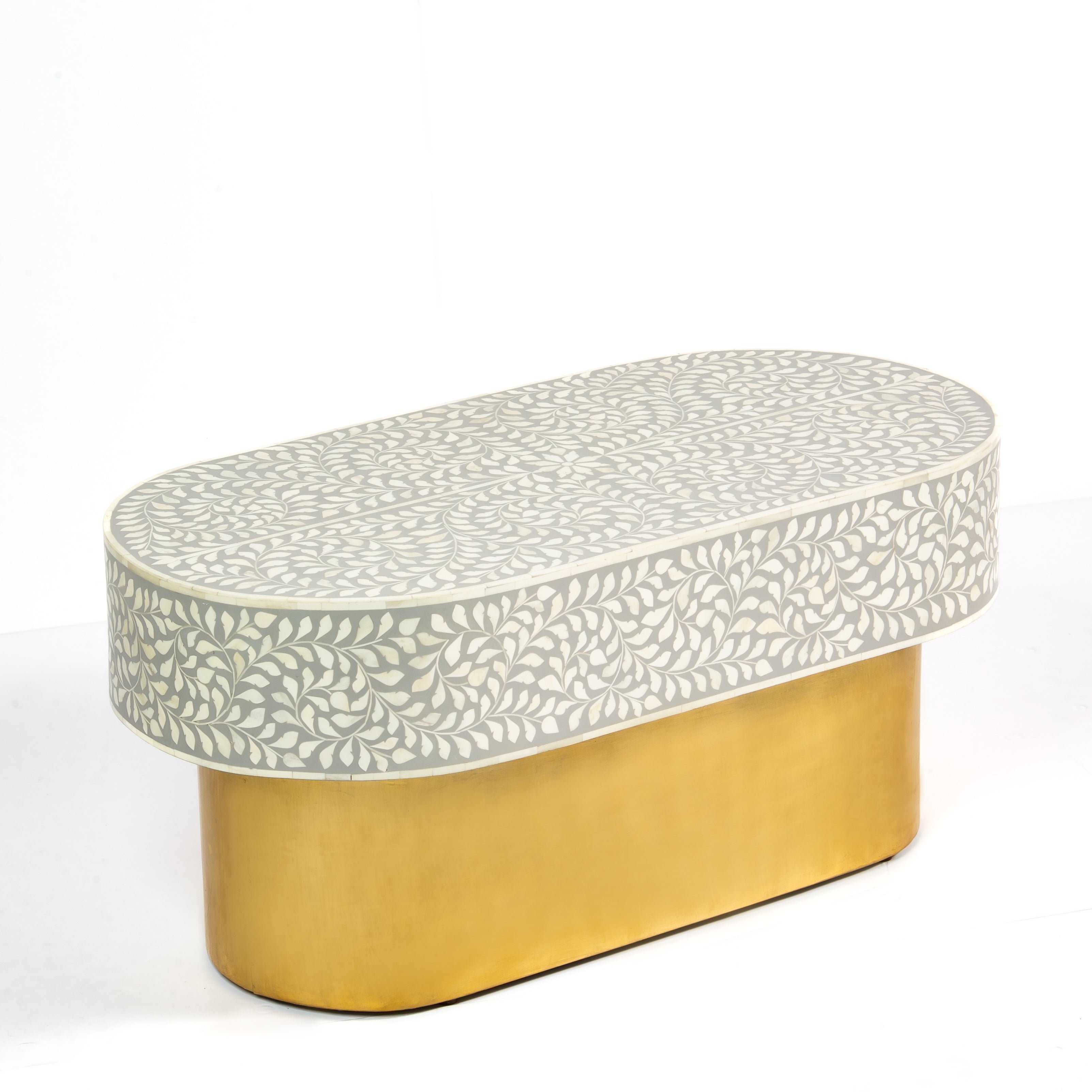 Elegant grey bone inlay coffee table with a gold base. Compact, handcrafted and eye-catching – a timeless addition to your space.