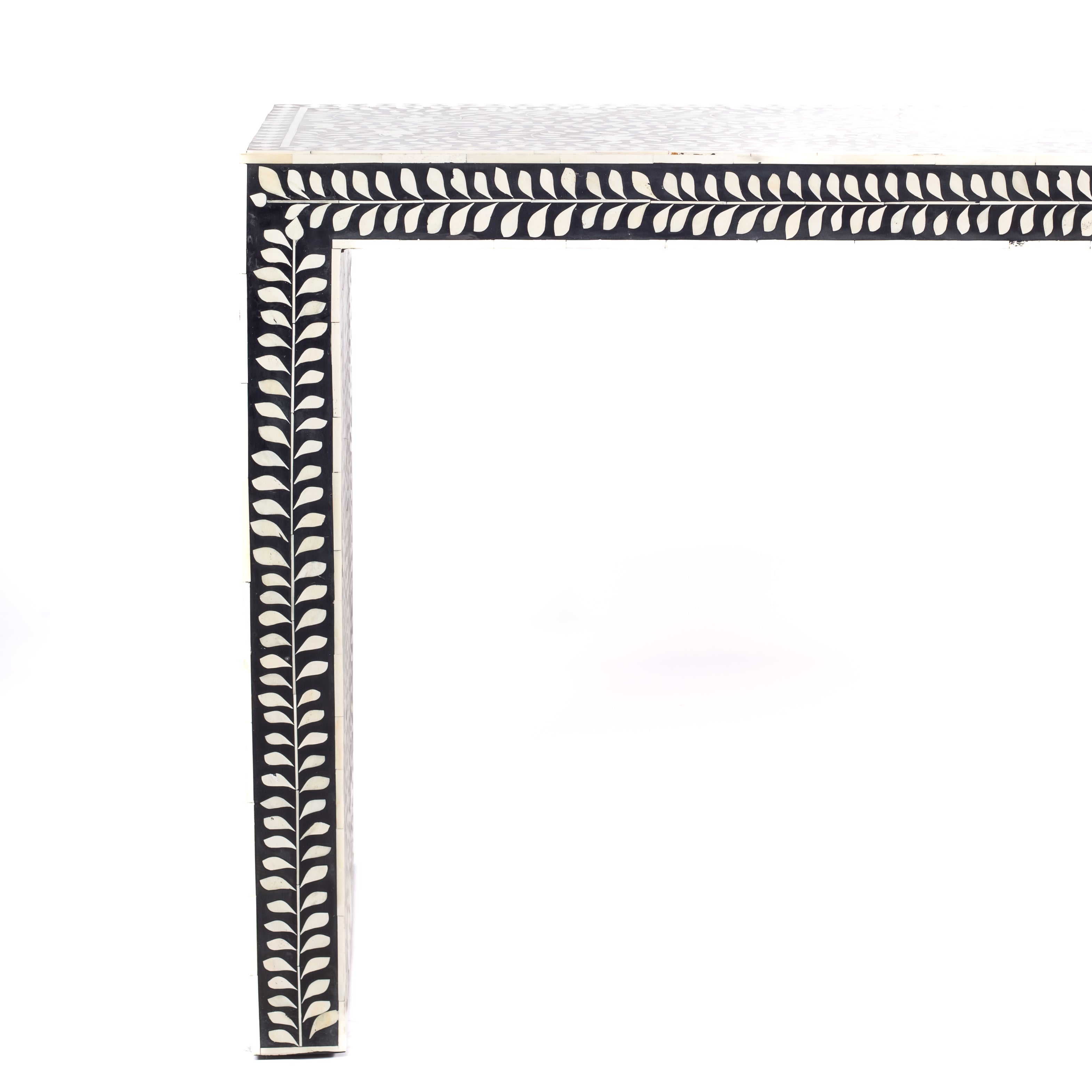 Black bone inlay console table with floral and vine motifs, handcrafted by artisans and finished with intricate detailing across the surface.