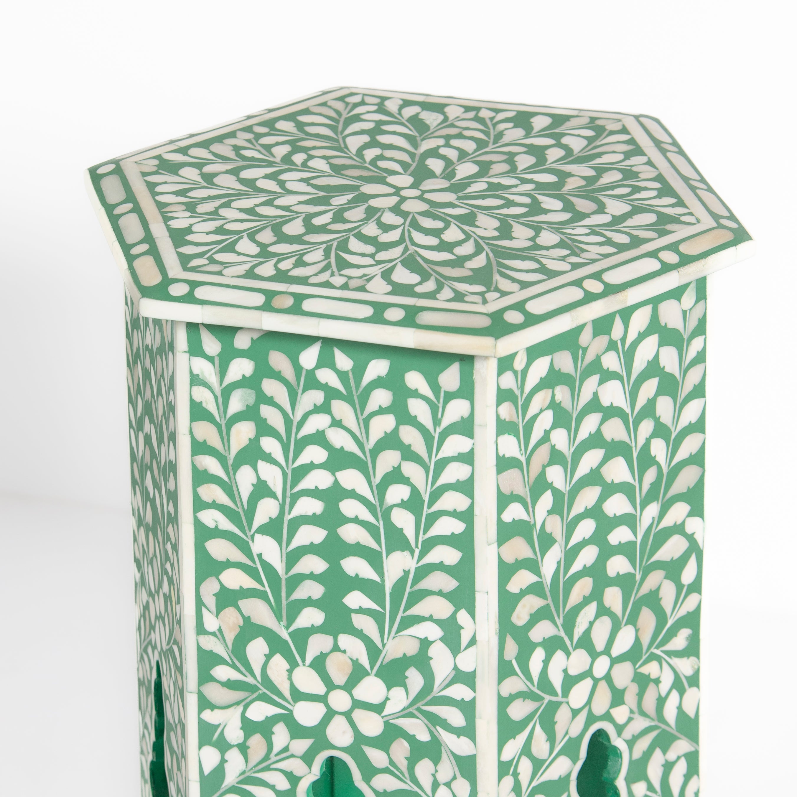 Handcrafted Jade side table featuring green bone inlay with a hexagonal silhouette, floral detailing, and arched legs.