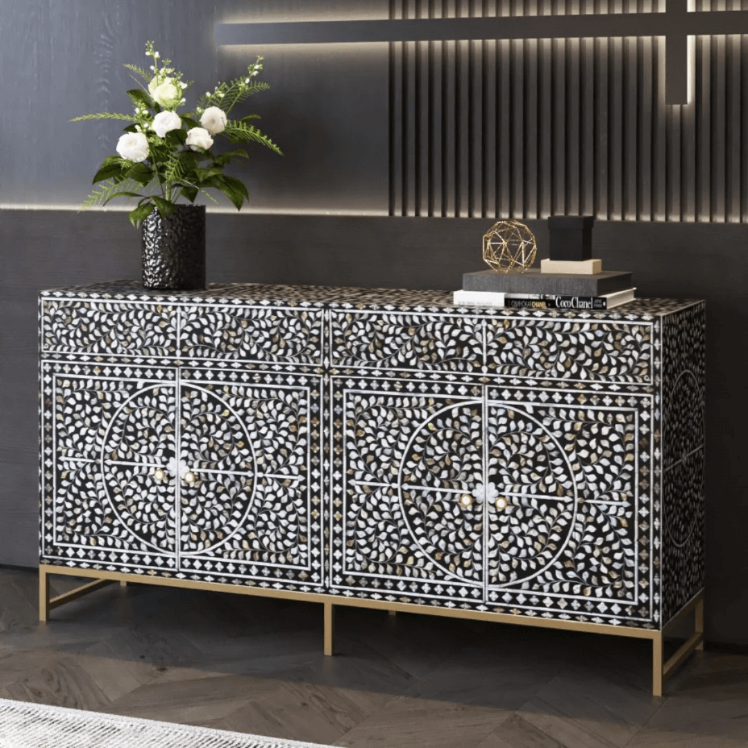 Handcrafted Black & White Sideboard Cabinet with intricate Mother of Pearl inlay, featuring a floral pattern and sleek Metal legs. A luxurious storage solution for any space.